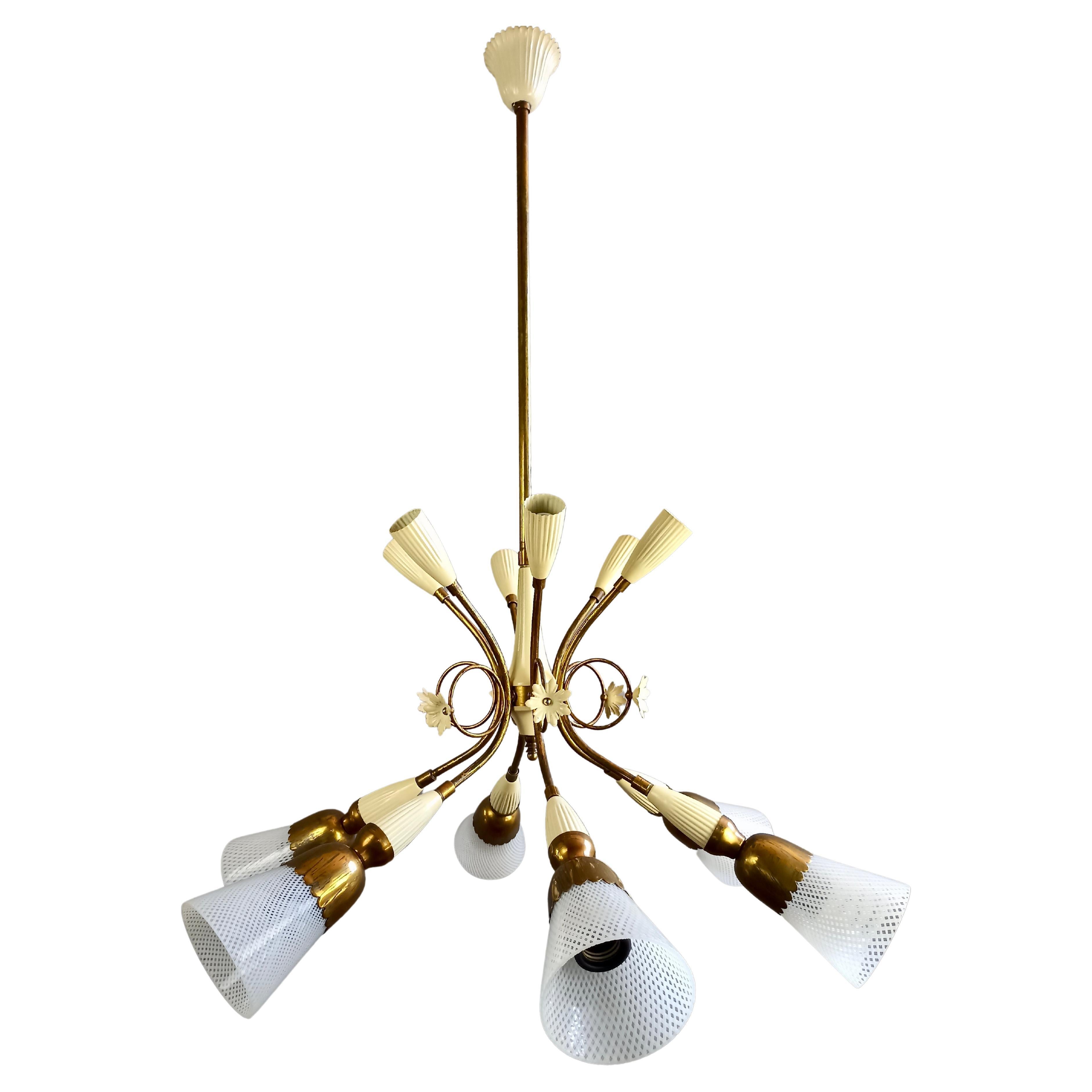 1950s Murano glass and gilt brass twelve-light Italian chandelier.