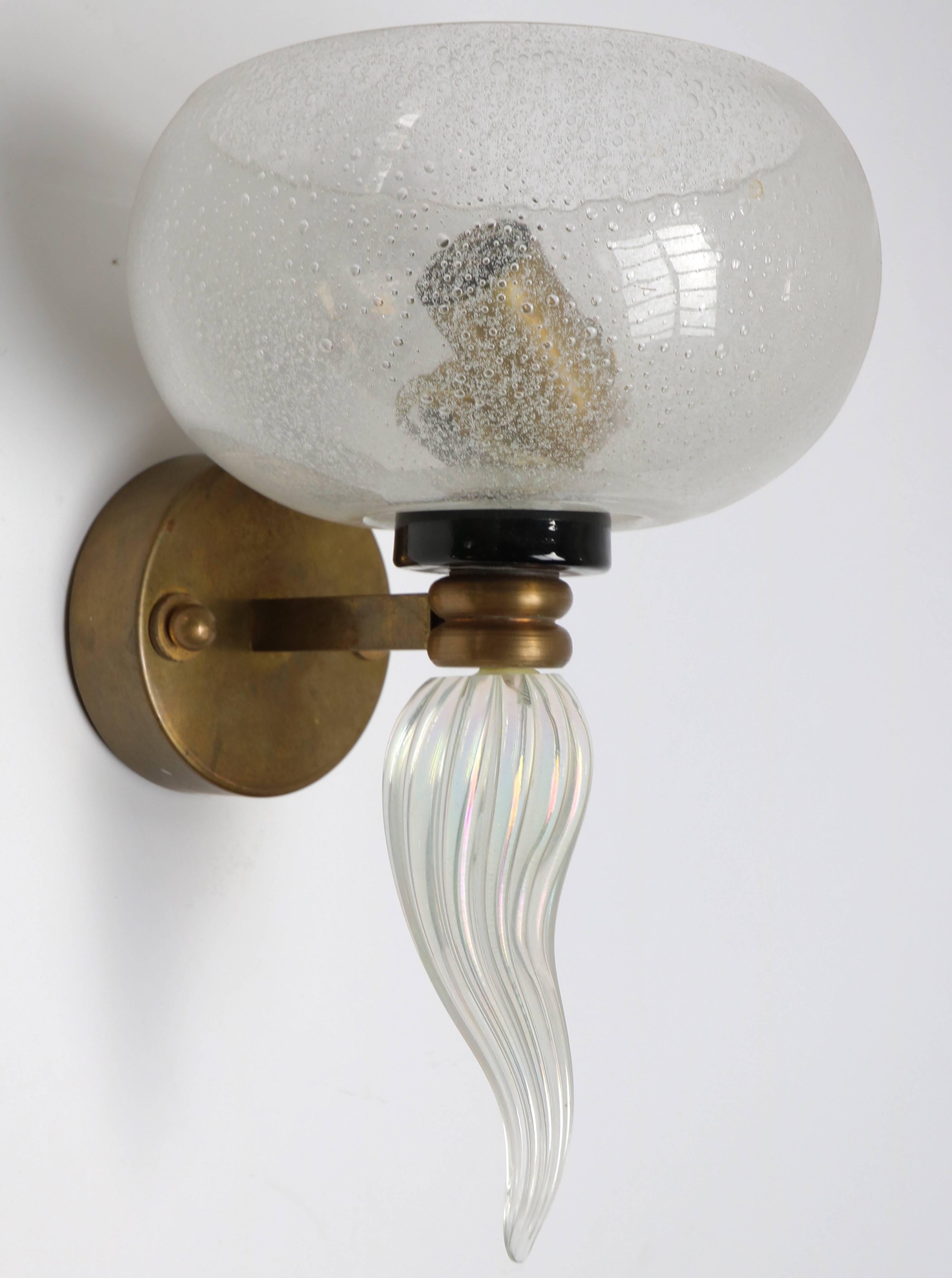 1950s murano clear bubbled glass sconce with one light, brass hardware.