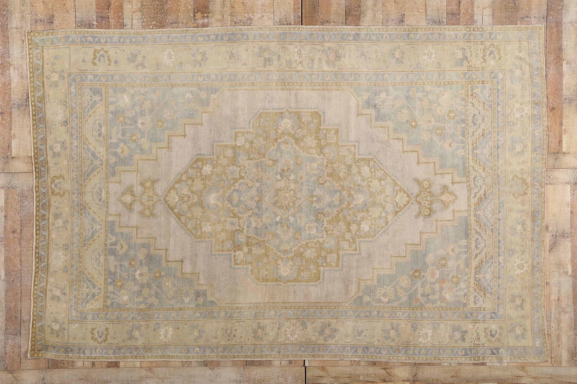 53997 Vintage Muted Turkish Oushak Rug, 06'10 x 10'06. This hand knotted wool vintage Turkish Oushak rug is a one-of-a-kind vision of restrained grandeur, where every motif speaks in the hushed tones of elegance and legacy. At its precious heart