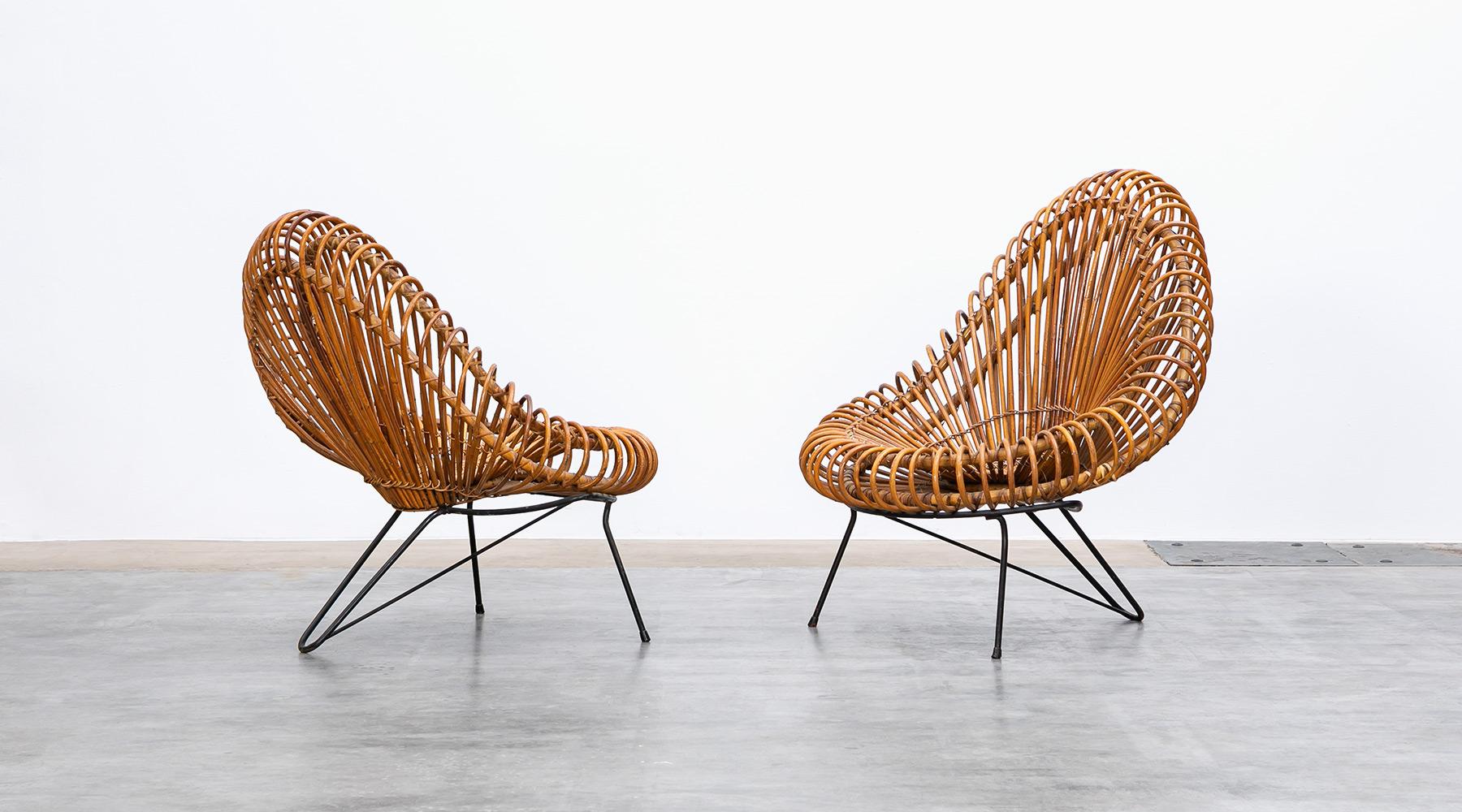 Basket lounge chairs by Janine Abraham and Dirk Jan Rol, France, 1950.

This basketware lounge chairs from 1955 is in excellent original condition, designed by Janine Abraham and Dirk Jan Rol. The elegant basket seat shell is held by black