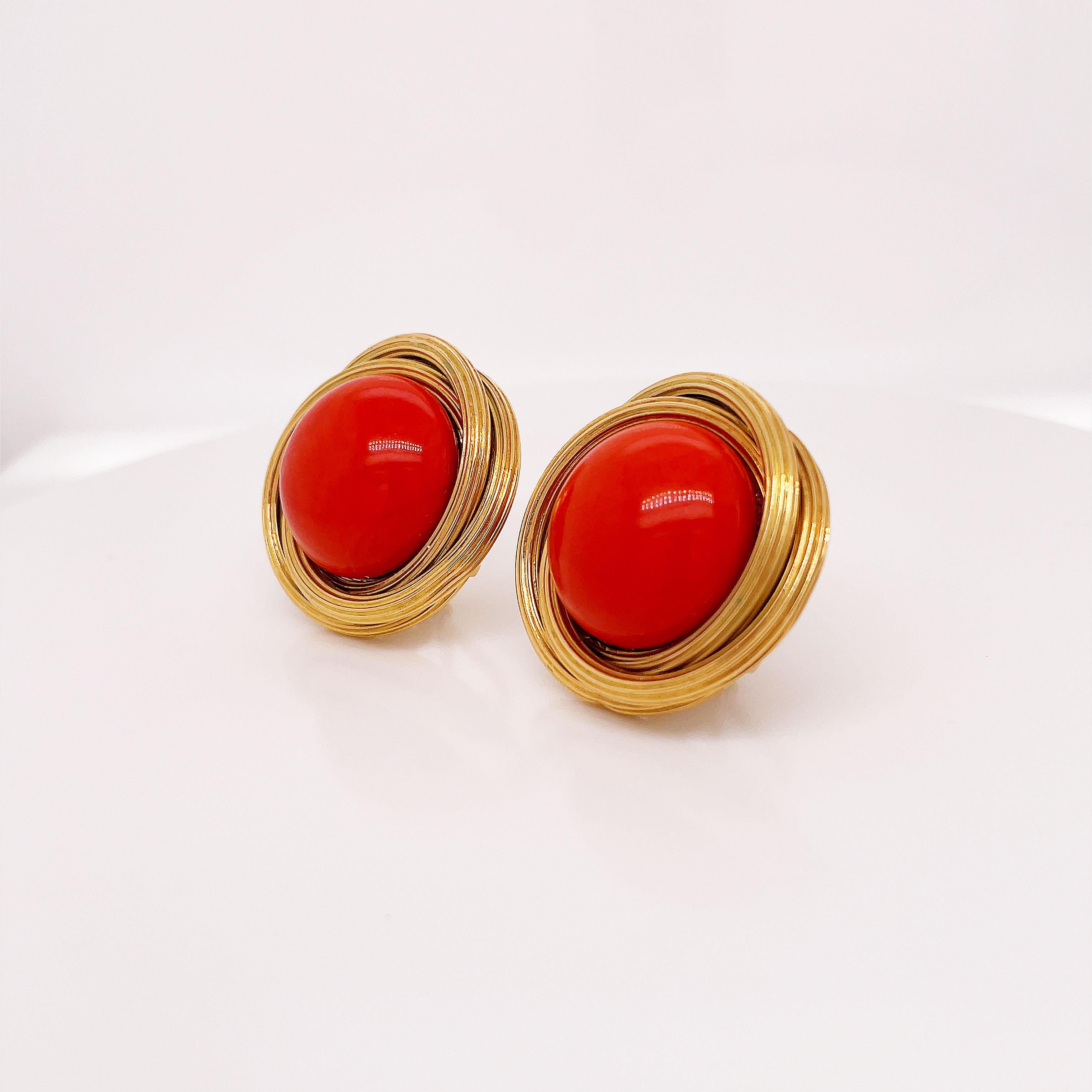 This is a gorgeous pair of Natural Coral Button Clip-On Earrings set in 18K Yellow Gold! This is a big, beautiful, and bold pair of 1950's clip-on earrings! The color of the coral in these earrings is outstanding! A beautiful and bright red-orange