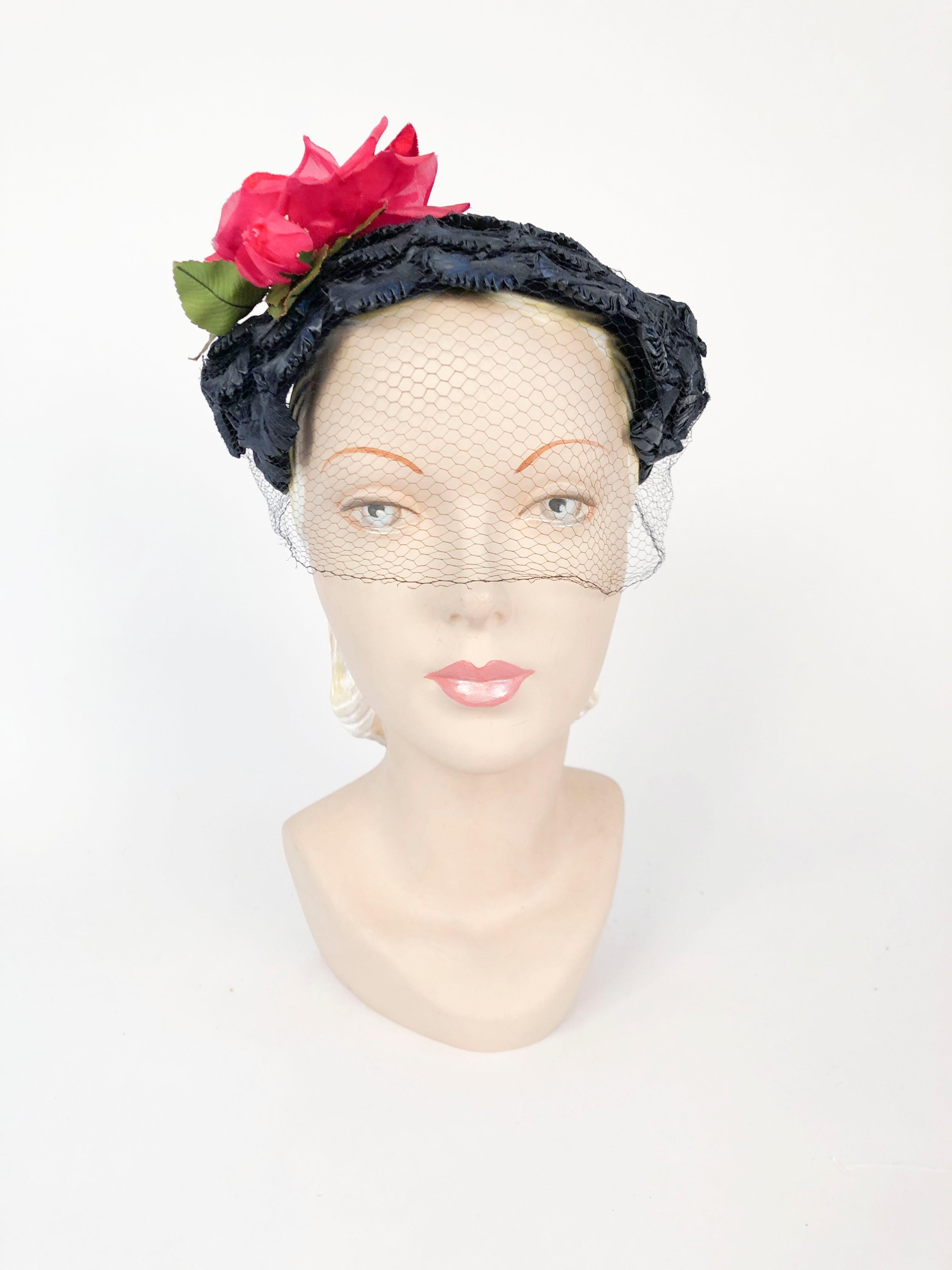 1950s Navy Raffia Hat With Silk and Velvet Rose and a full tieback veil/netting.