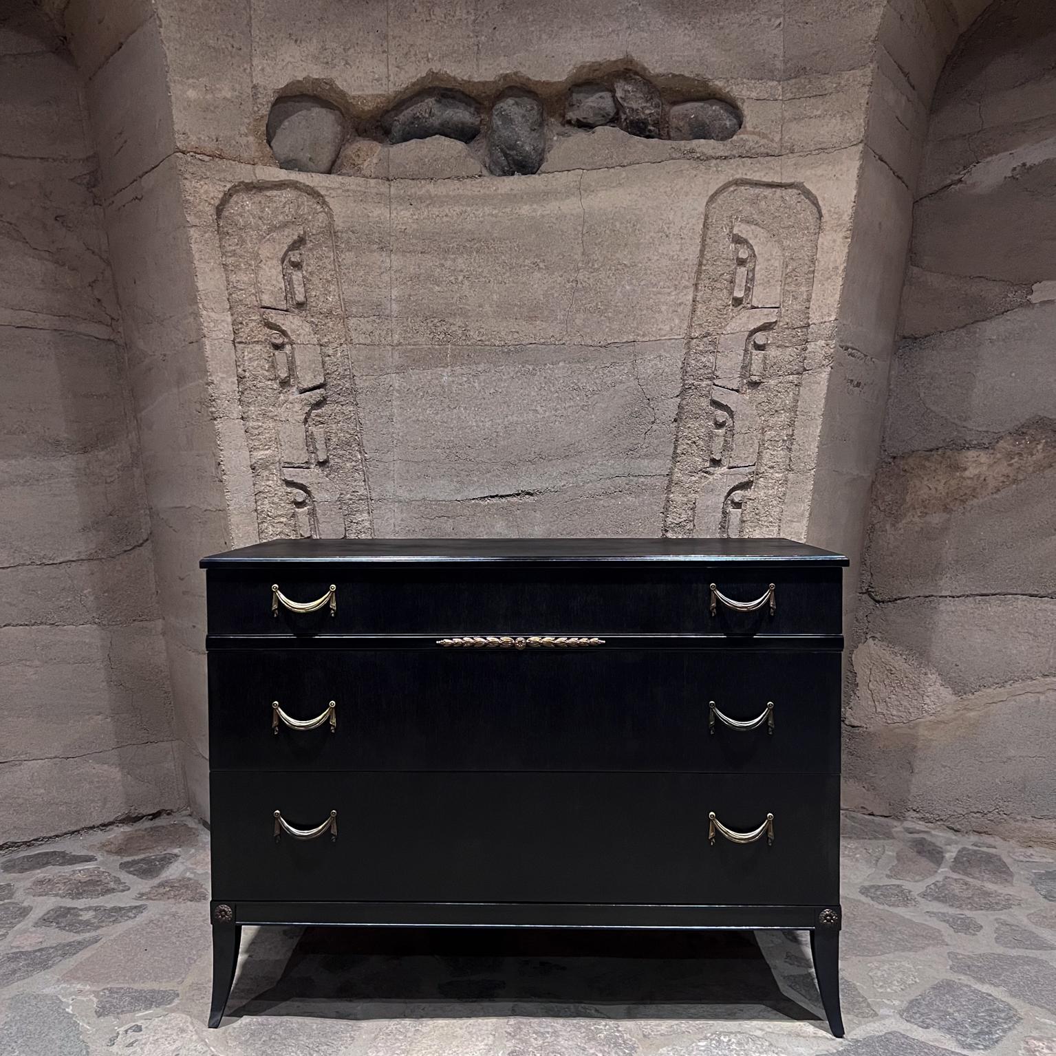 
1950s Neoclassical Wood Dresser bronze detail by Landstrom Furniture Company
bronze pulls with draped design 
34.5 h x 20.25 d x 46.25 w
Drawer 1: 3.38 H x 17.38D x 42.5 W Drawer 2: 7.25 Drawer: 3 7.88
Preowned original vintage condition. Restored