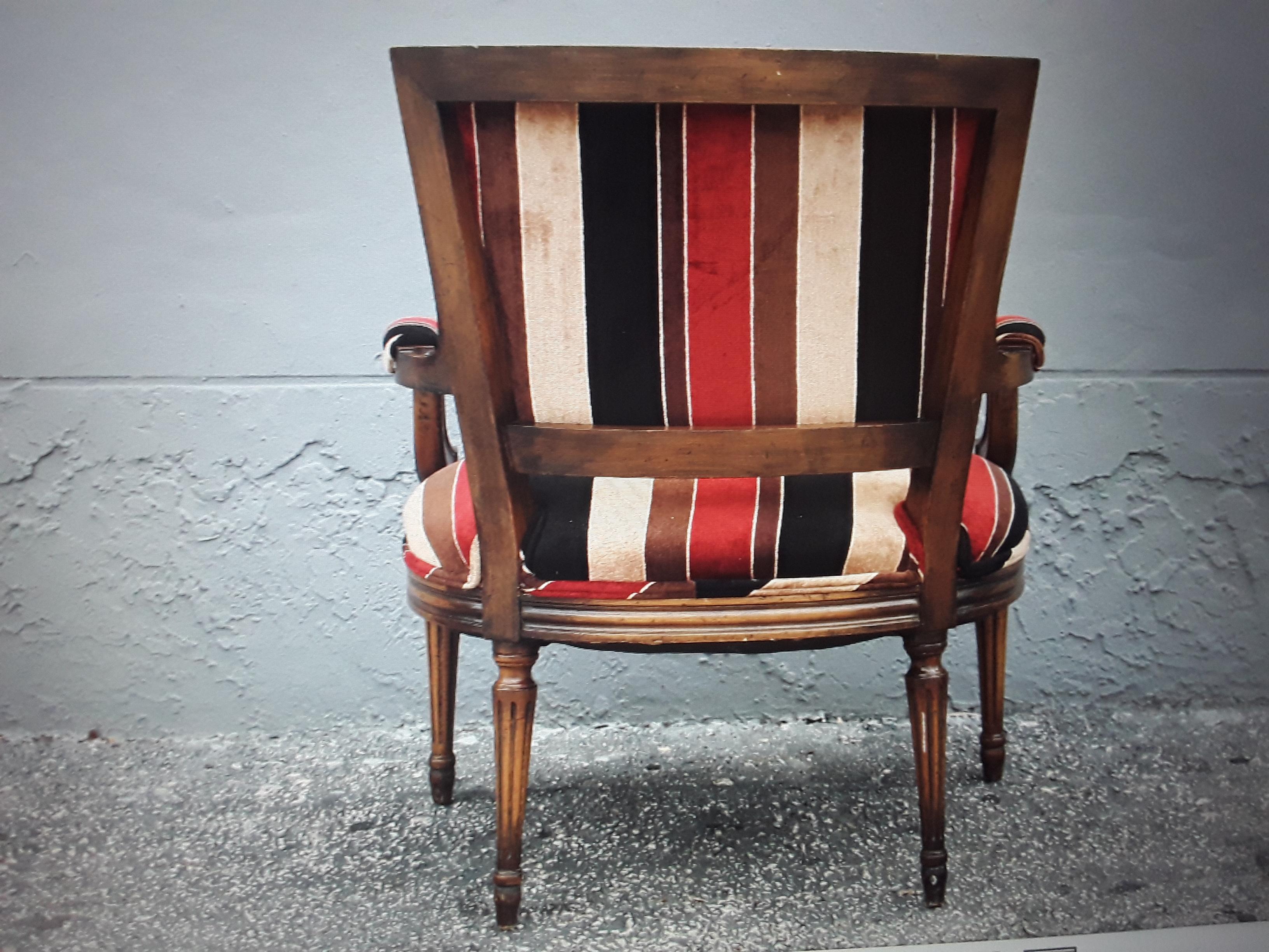 1950's Neoclassical style Carved Armchair Now Upholstered in a Modern Textile.