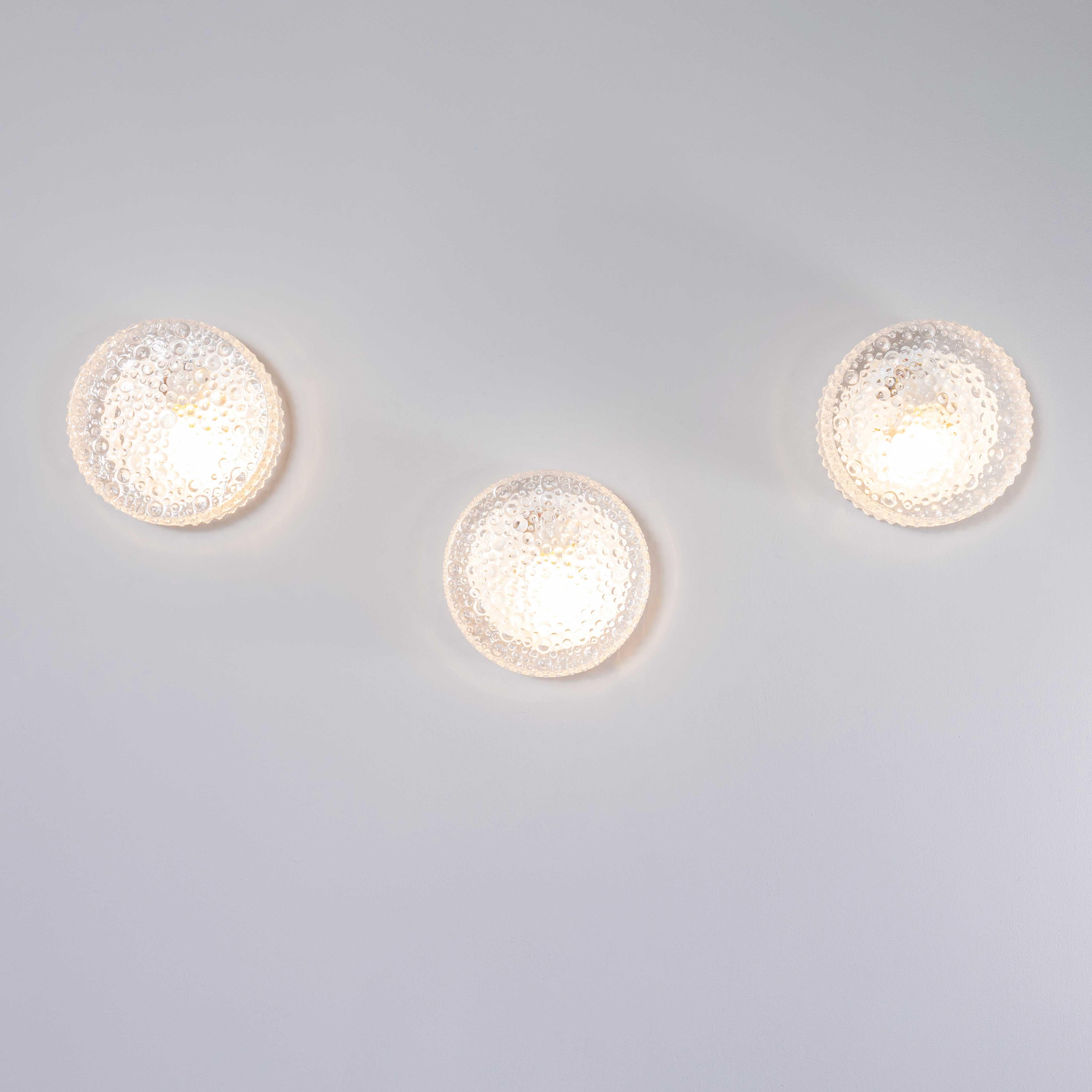 1950’s New Old Stock Czech Clear Bubble Wall – Ceiling Lamp. 
Each lamp has been cleaned and restored. Each lamp is individually wired with new cable and cable connectors to BS EN 60598. The lamp is fitted with a standard E27 threaded lamp holder