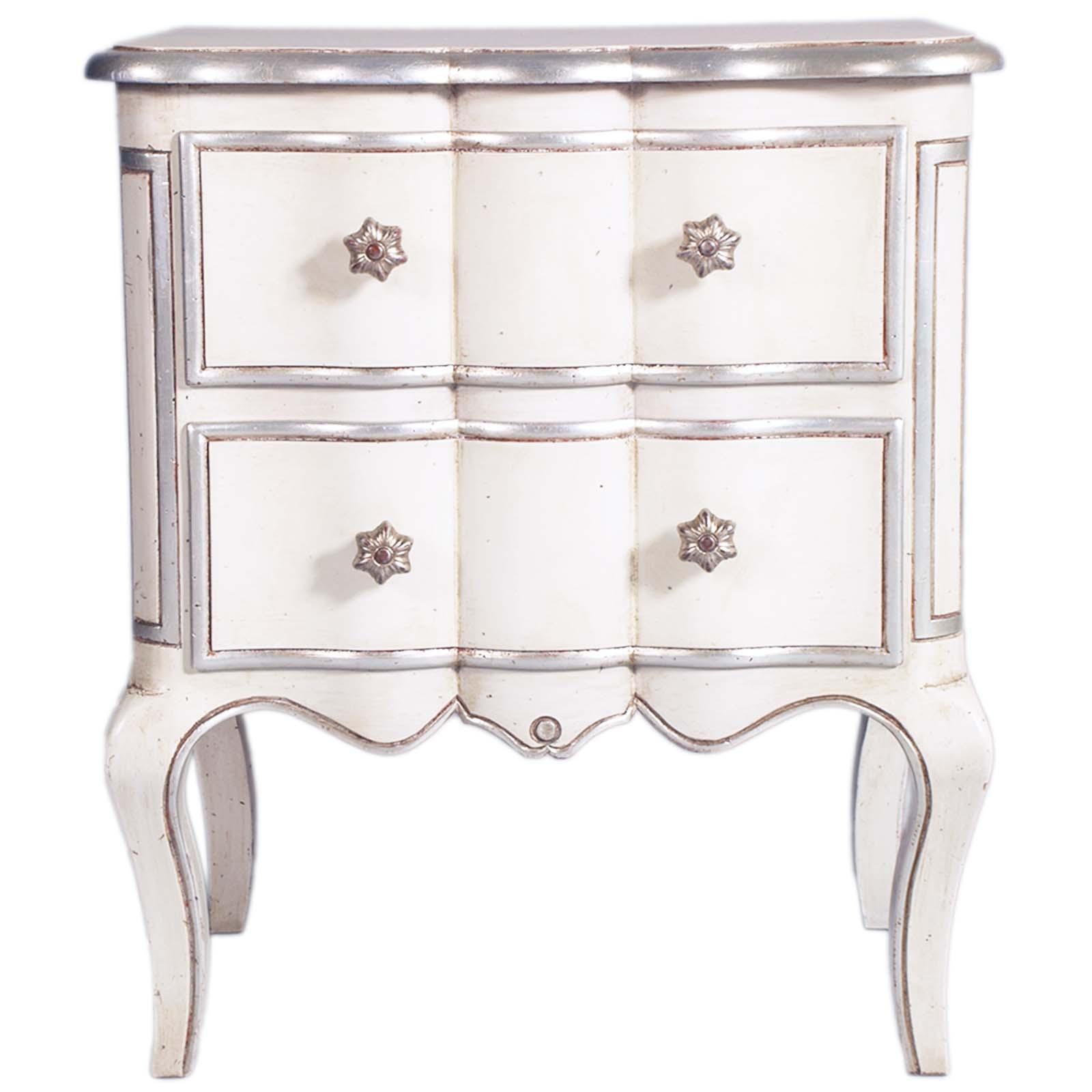 A precious 1950s Night Stand ARTE BASSANO in solid oak, Venetian Baroque style from the 1700s, lacquered and decorated with silver leaf. Cast bronze handles

About ARTE BASSANO
Located in Veneto, near Venice, a few steps from the city of Bassano del