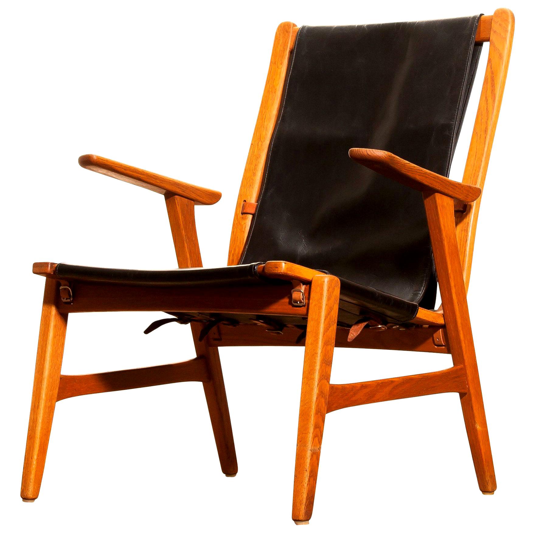 Swedish 1950s, Oak and Leatherette Hunting Lounge Chair 'Ulrika' by Östen Kristiansson