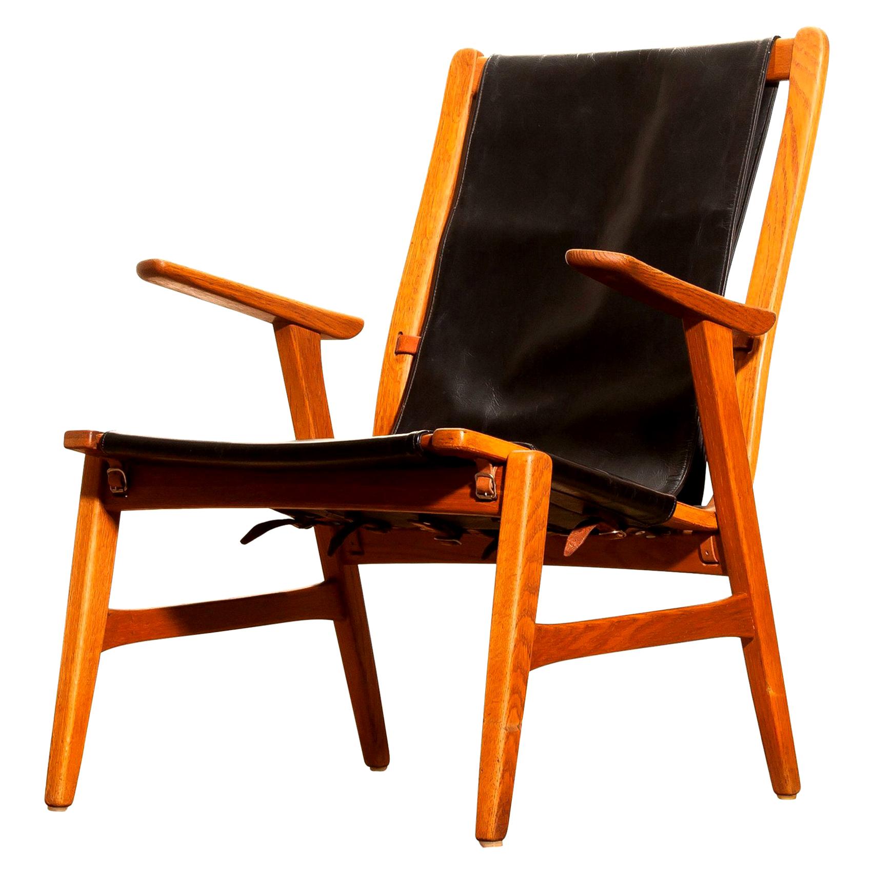 1950s, Oak and Leatherette Hunting Lounge Chair 'Ulrika' by Östen Kristiansson