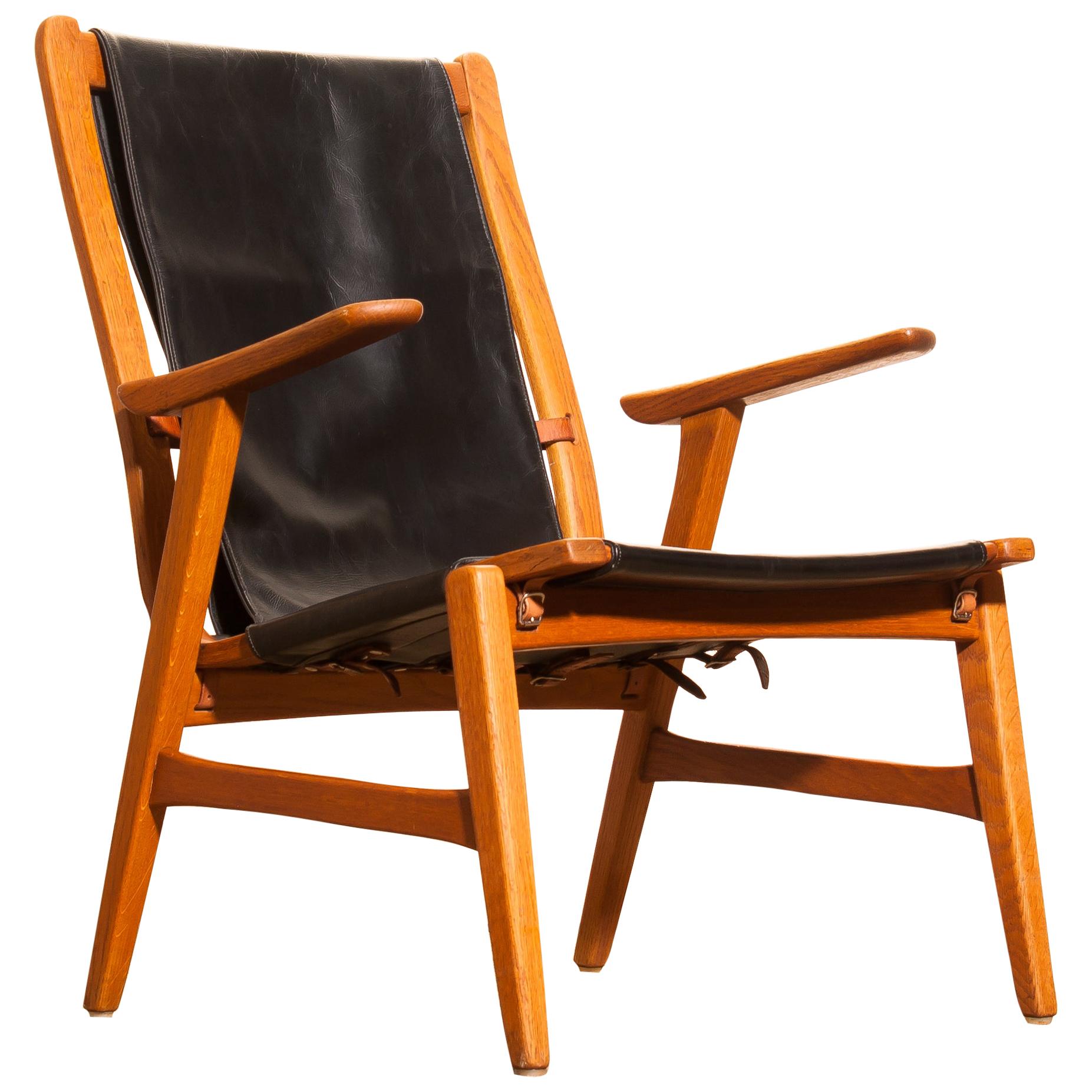 1950s, Oak and Leatherette Hunting Lounge Chair 'Ulrika' by Östen Kristiansson