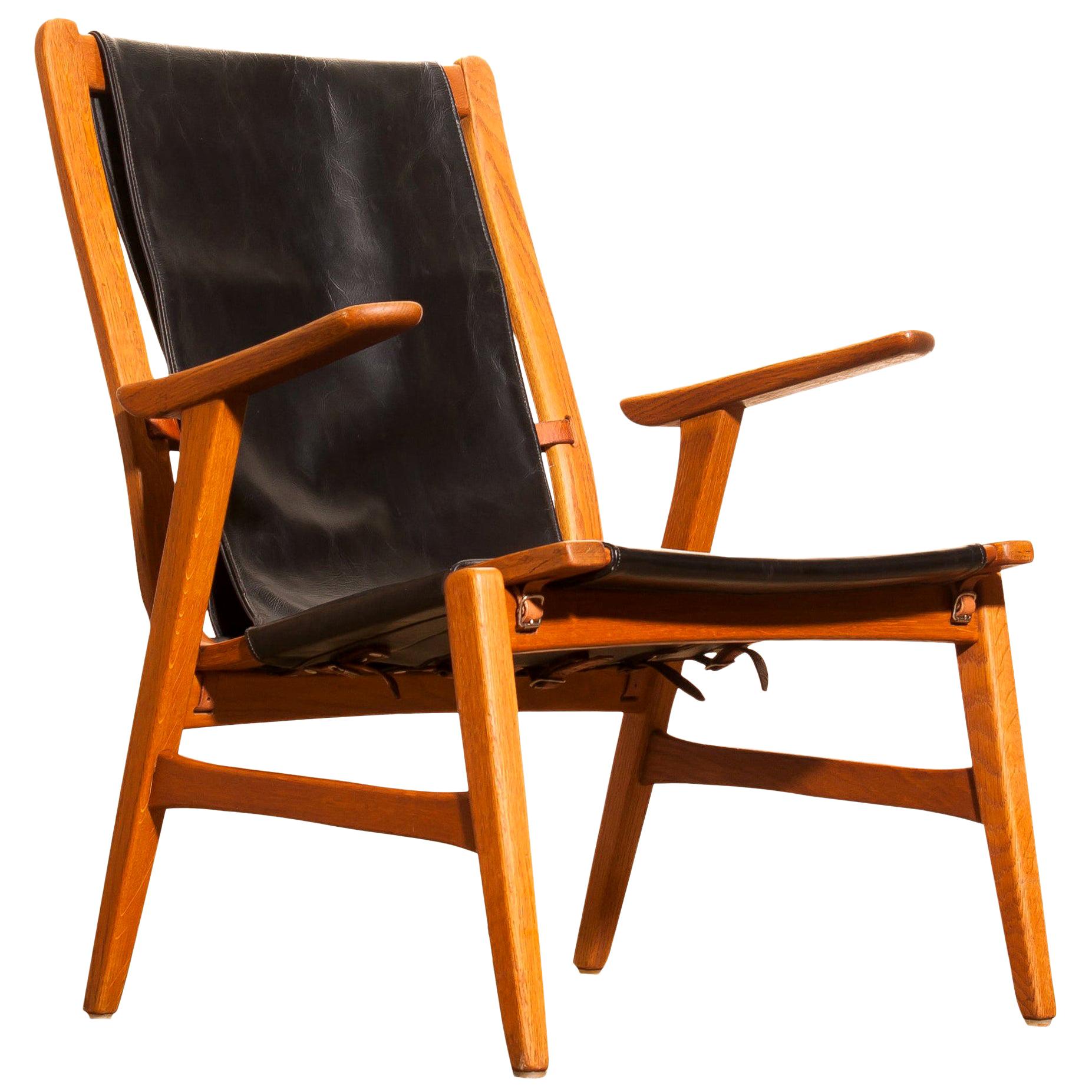 1950s, Oak and Leatherette Hunting Lounge Chair 'Ulrika' by Östen Kristiansson