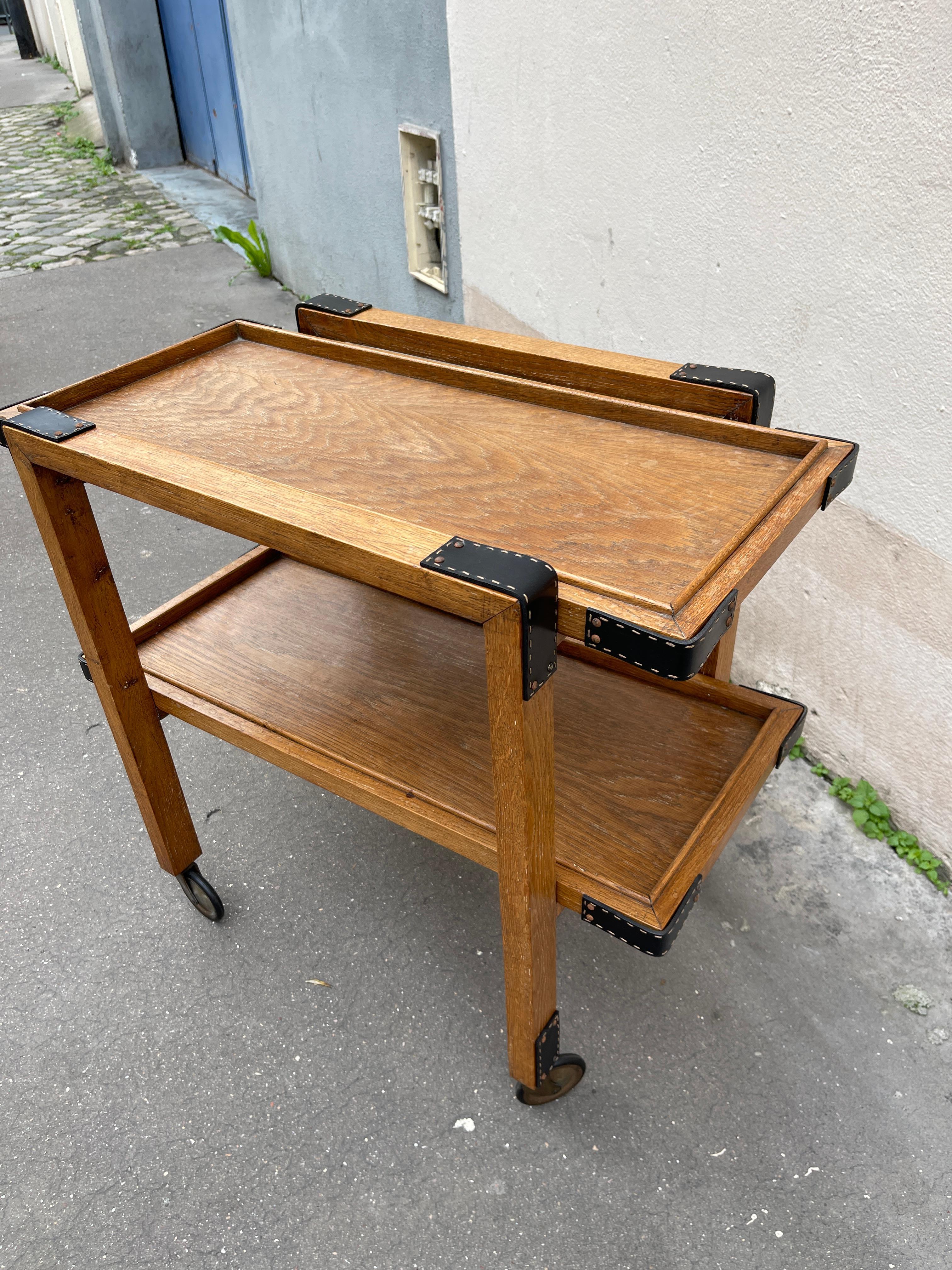 French 1950's Oak and stitched leather bar cart by Jacques Adnet For Sale