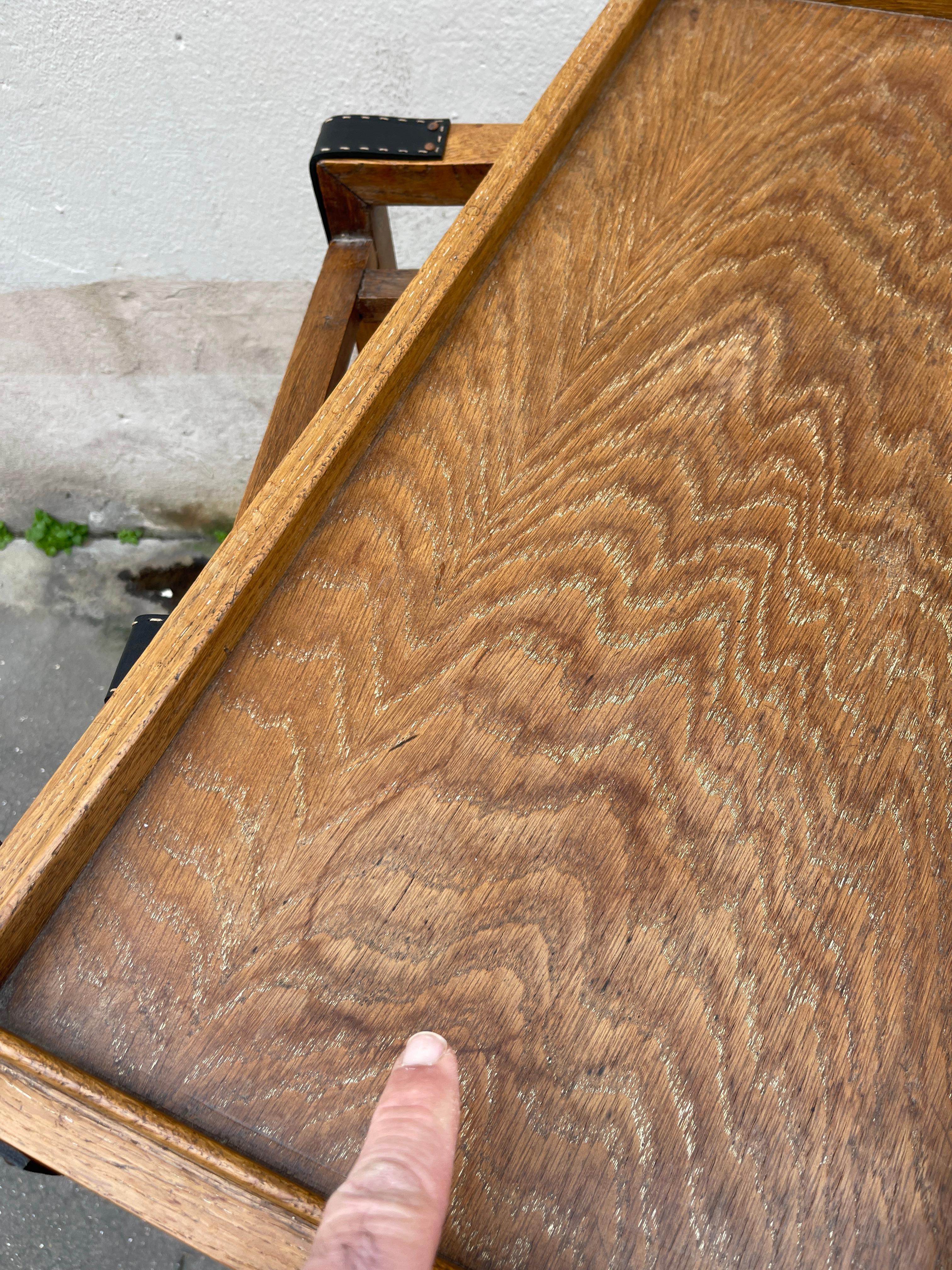 Leather 1950's Oak and stitched leather bar cart by Jacques Adnet For Sale
