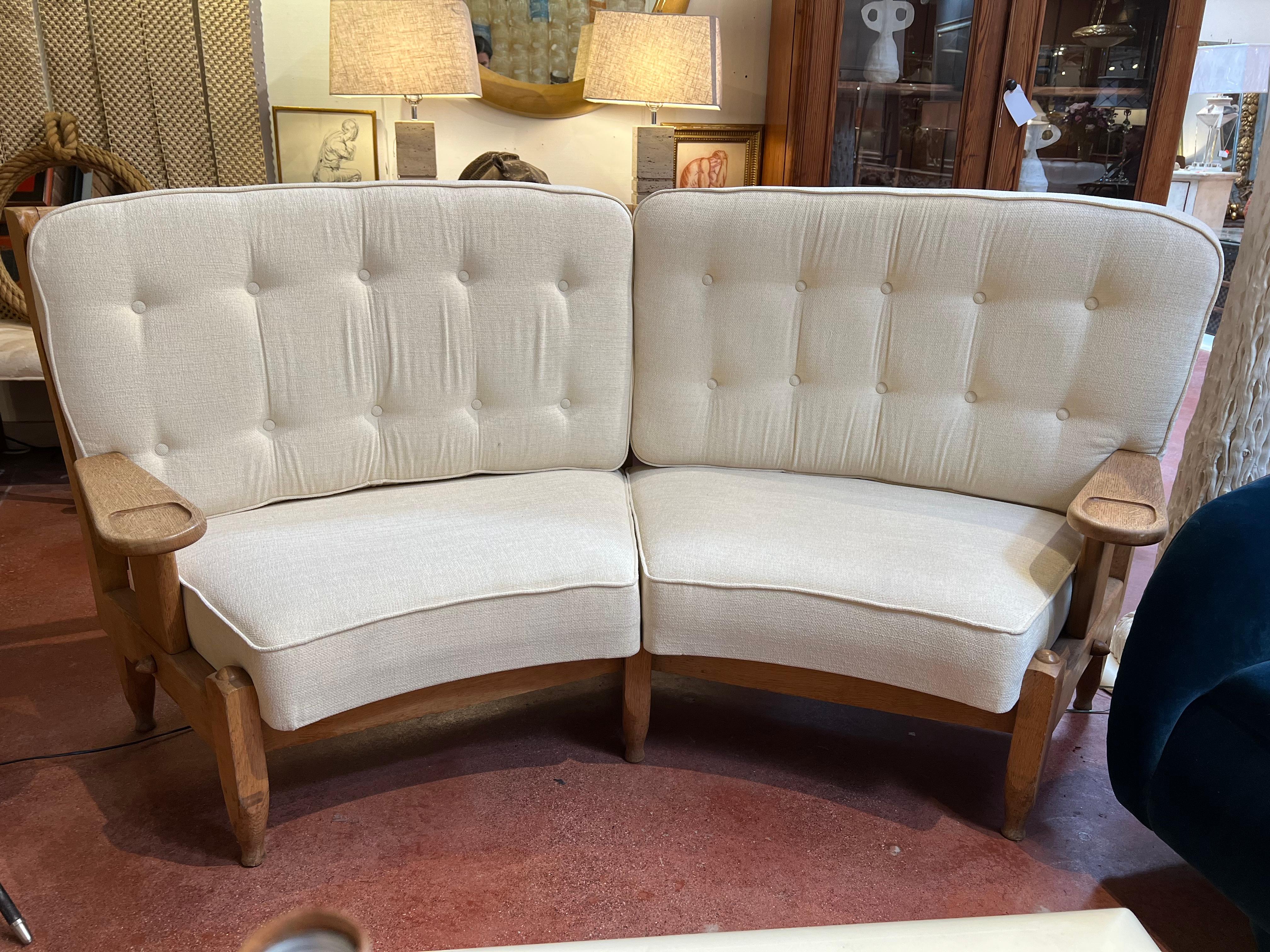 1950’s French oak sofa designed by Guillerme et Chambron. New upholstery. Arm height 22