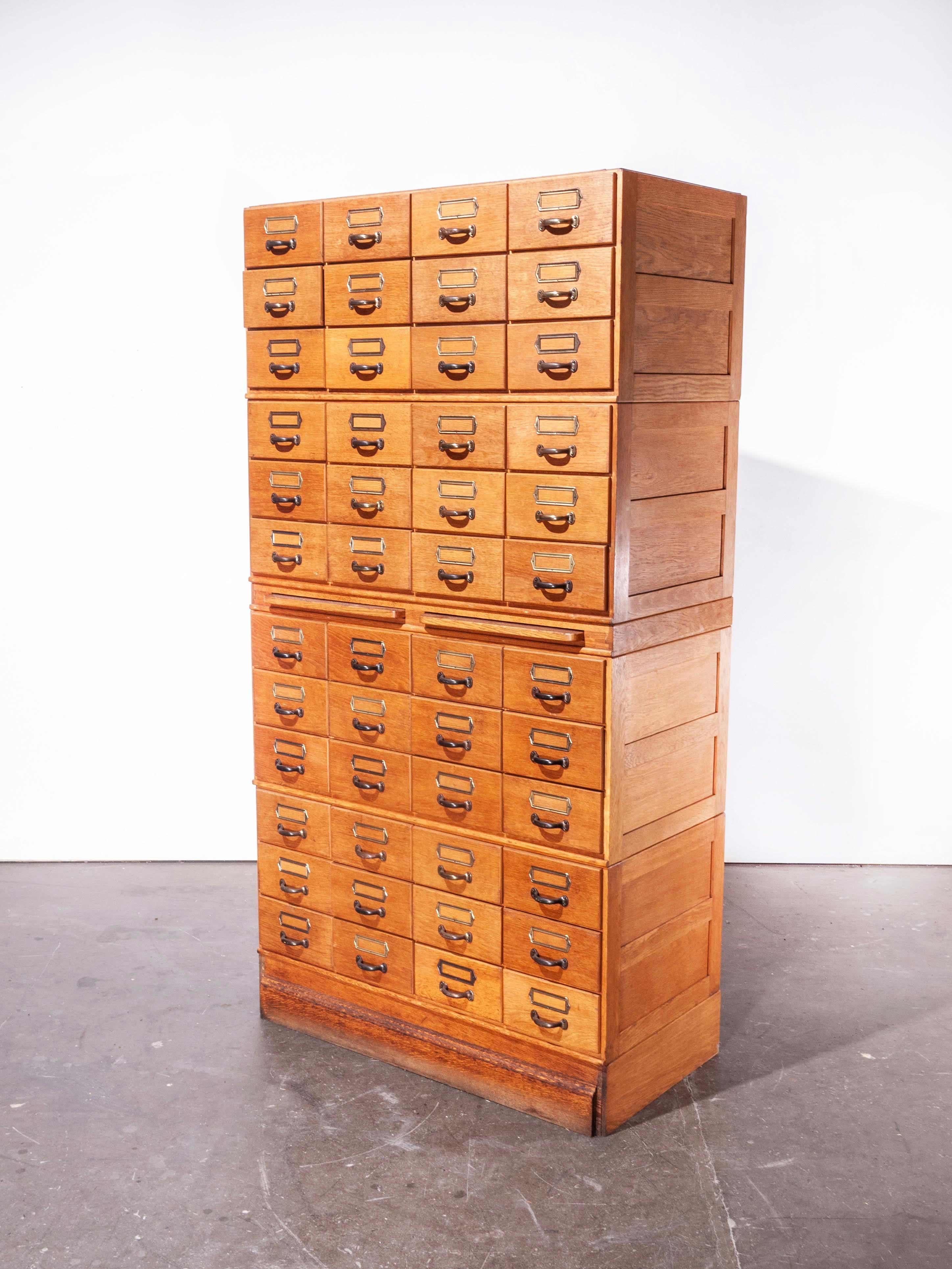 1950s oak tall multi drawer chest of drawers, storage cabinet, filing
1950s tall multi drawer chest of drawers, storage cabinet. With forty eight drawers and two sliding pullout / pull-out shelves this is a stunning practical chest. Sourced from a