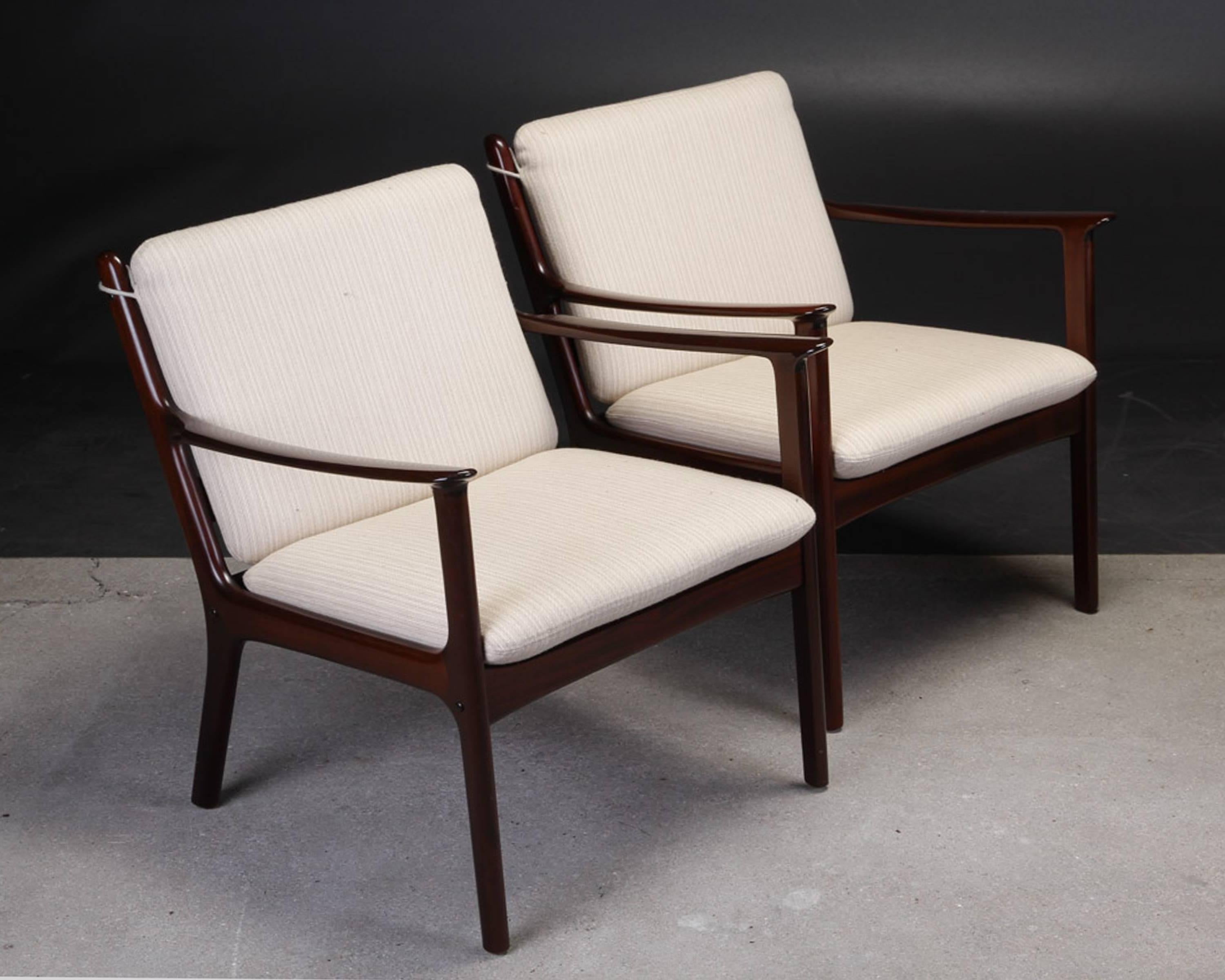 Set of two Ole Wanscher PJ112 mahogany lounge chairs produced by P. Jeppesens Møbelfabrik,

The chairs have been overlooked and refinished by our cabinetmaker to insure that they are in very good condition with only minimal signs of age and use and
