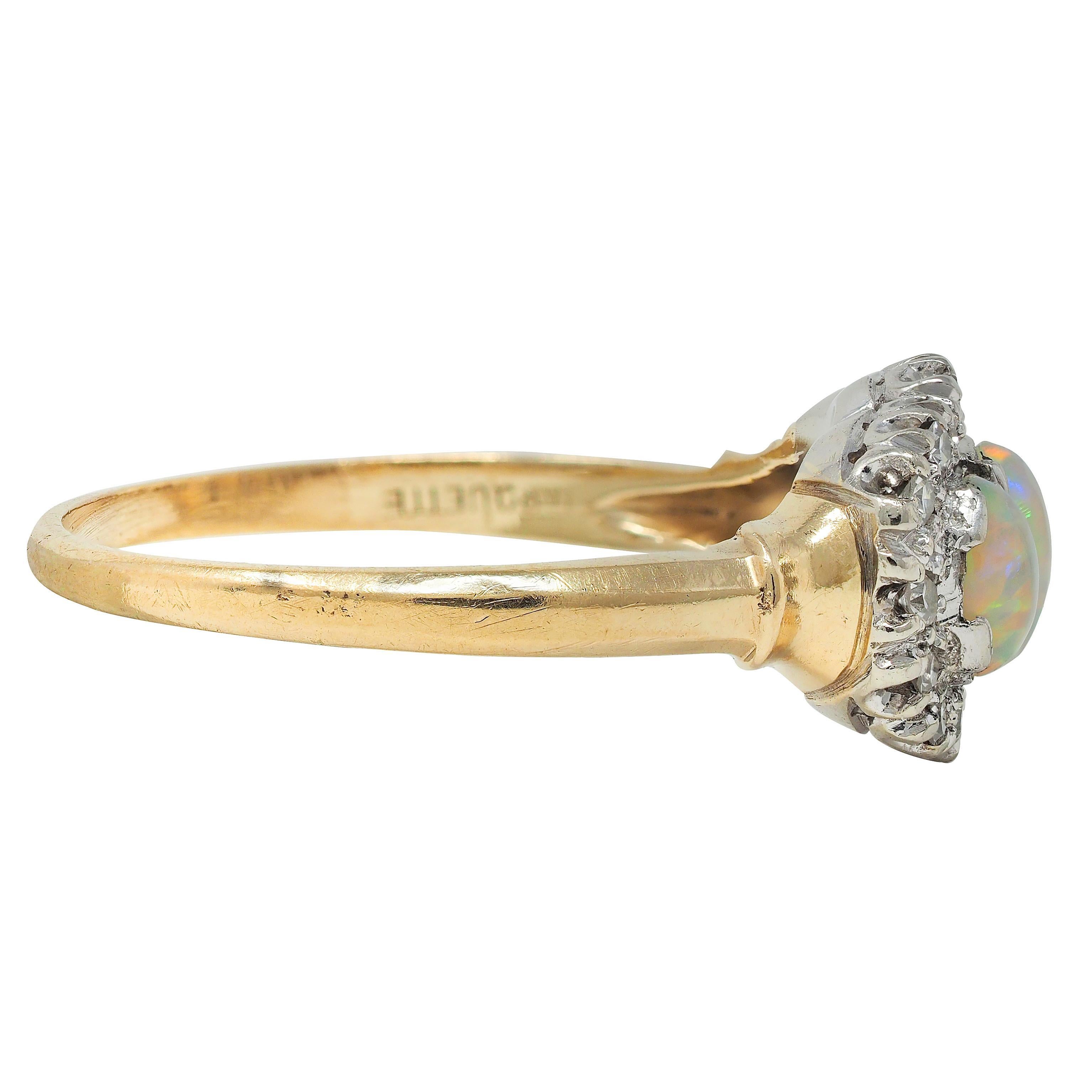 1950's Opal Cabochon Diamond 14 Karat Two-Tone Gold Vintage Halo Ring In Excellent Condition For Sale In Philadelphia, PA