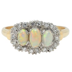 1950's Opal Cabochon Diamond 14 Karat Two-Tone Gold Vintage Halo Ring