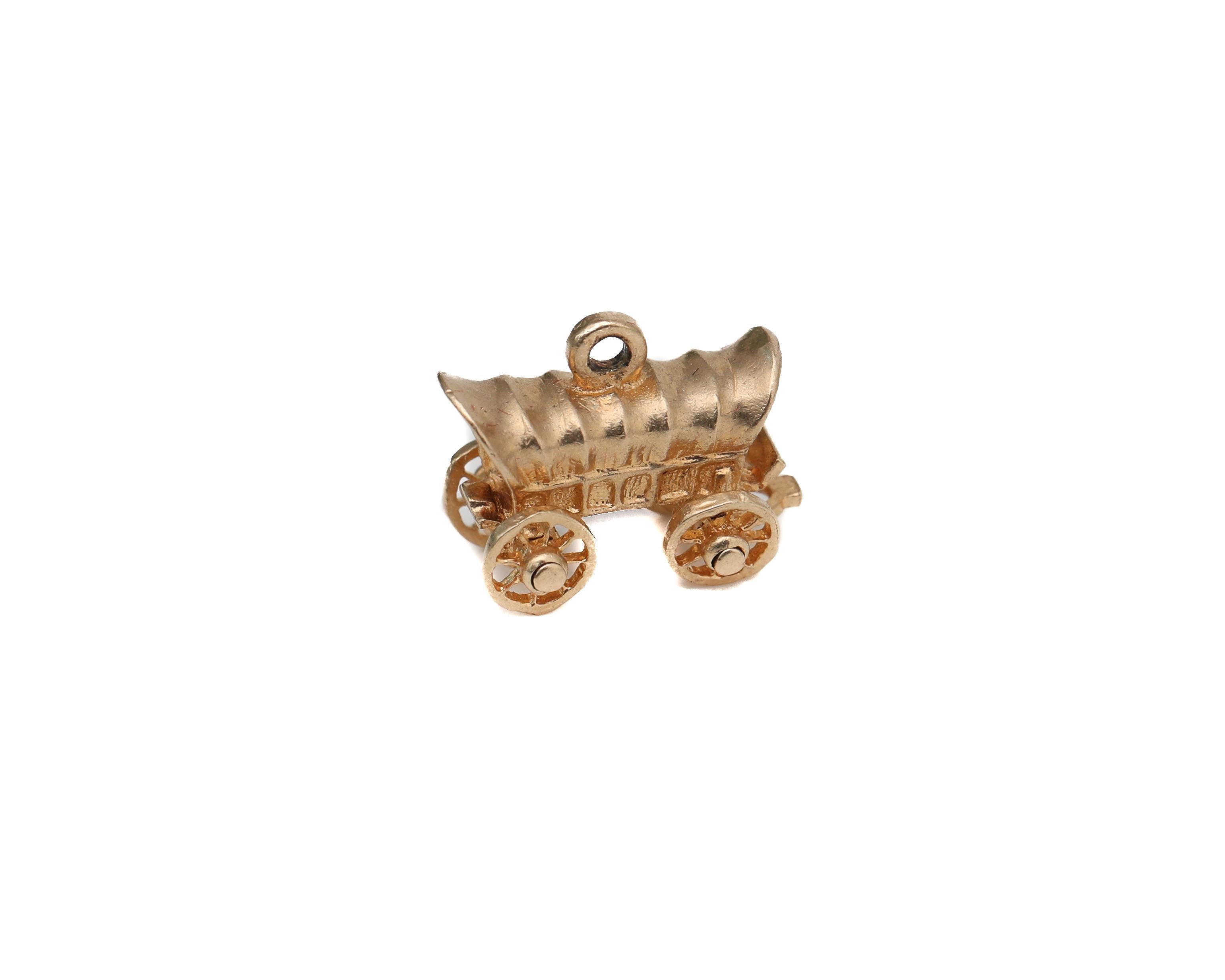 Charm details:
Gold: 14 karat yellow gold
Weight: 1.82 grams
Measurement:

1950s Oregon Trail Car Wagon crafted in 14 karat yellow gold. Great detailing and intricacy in showing the wagon. 