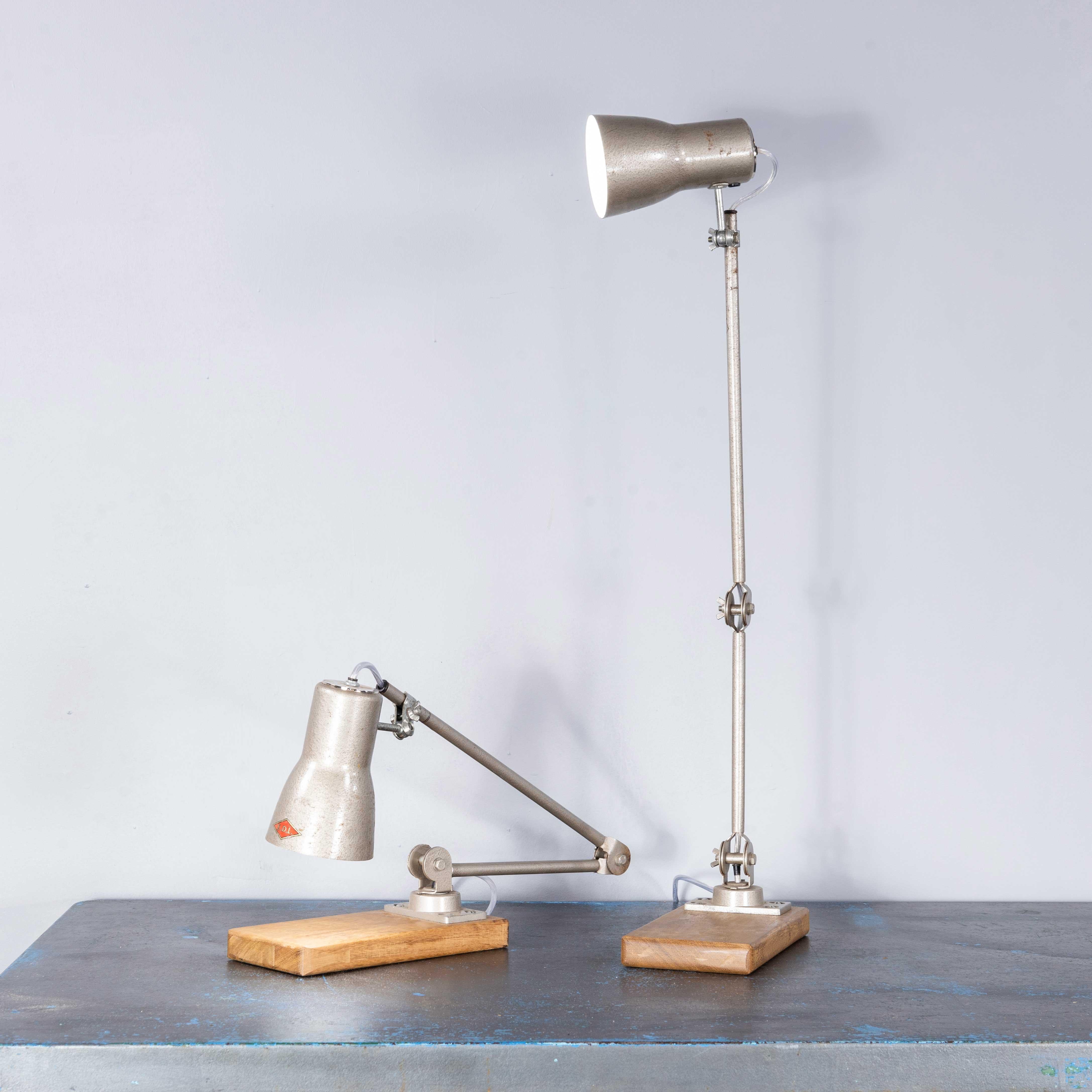 1950’s Original Articulated Machinists Desk Lamps By EDL – Pair
1950’s Original Machinists Desk Lamps By EDL – Pair. EDL started production in 1922 in Staffordshire England and is still producing to this day. This pair of lamps in classic 50’s
