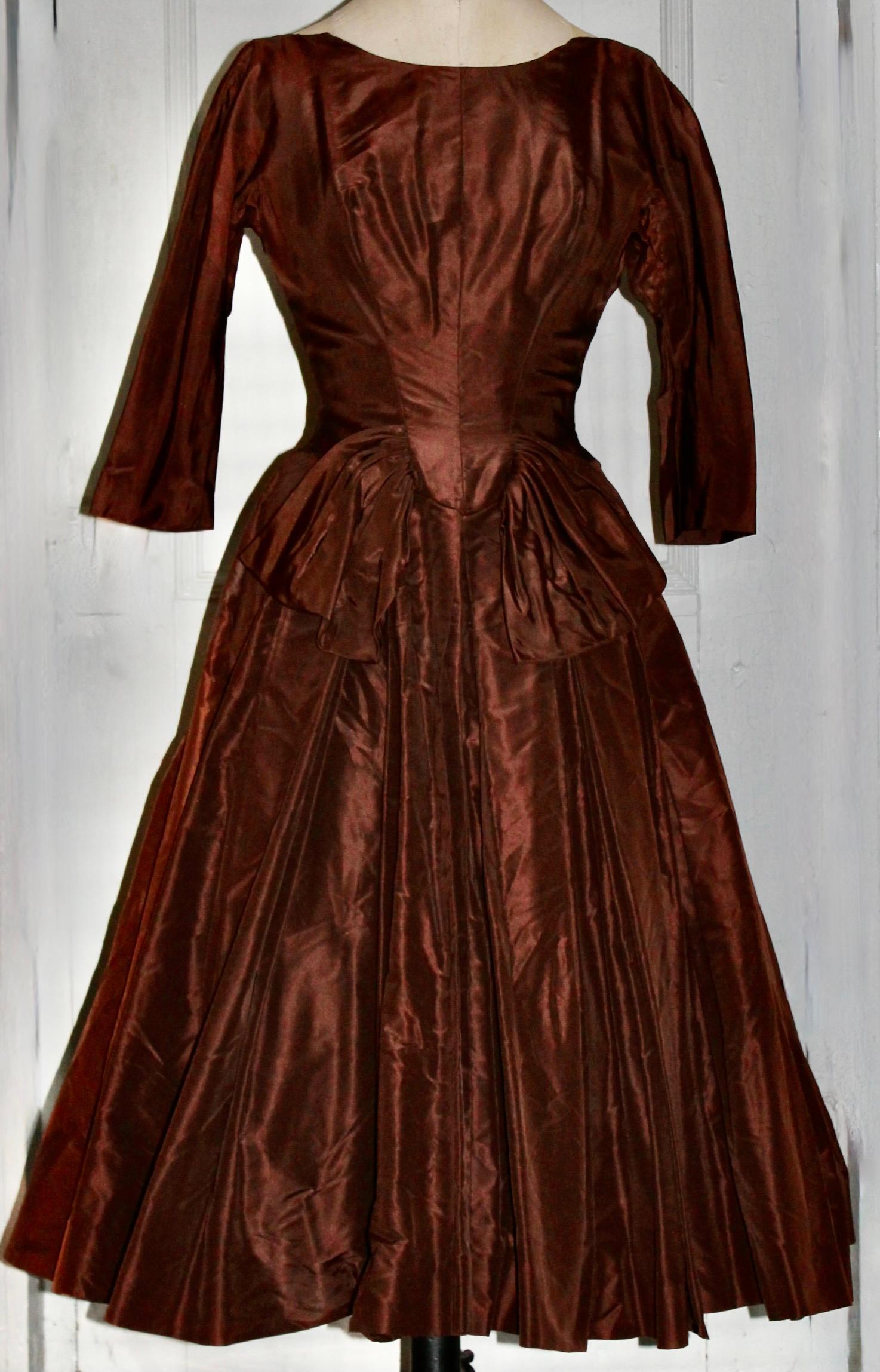 1950's BallRoom Dress.  Designer Max Cory Rudolf NYC Boutique. Tulle Slip attached to skirt.  Bow in front below waist.  Zipper in back. Appx USA 6