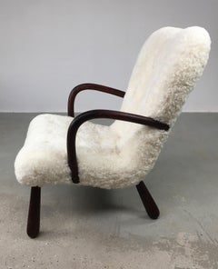 1950's Original Danish Clam Chair Reupholstered in Natural White Sheepskin