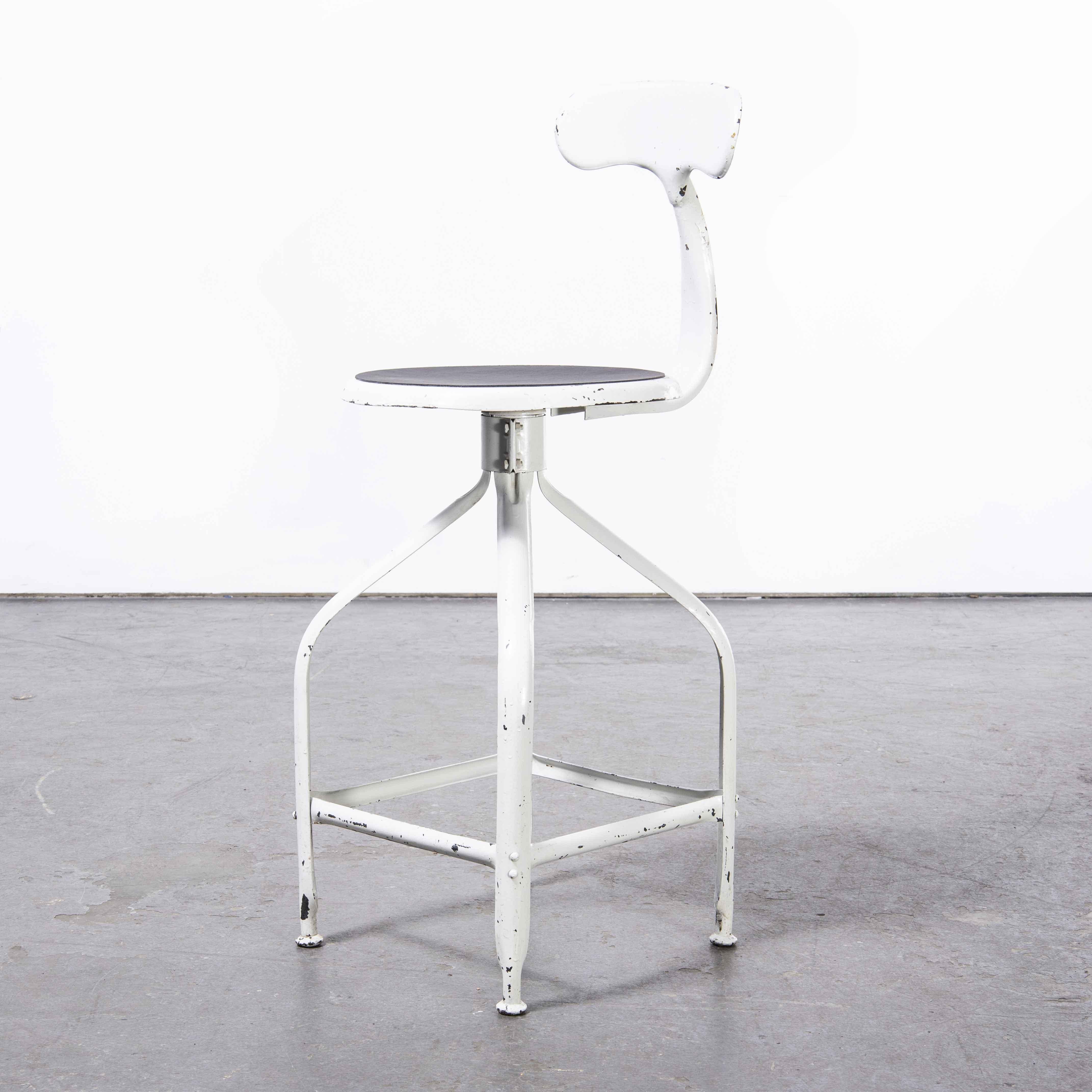 1950’s Original French white Nicolle industrial swivel chair

1950’s Original French Nicolle industrial swivel chair. One of our all time favourite products, exceptional in design with the minimal use of materials yet strong, well proportioned