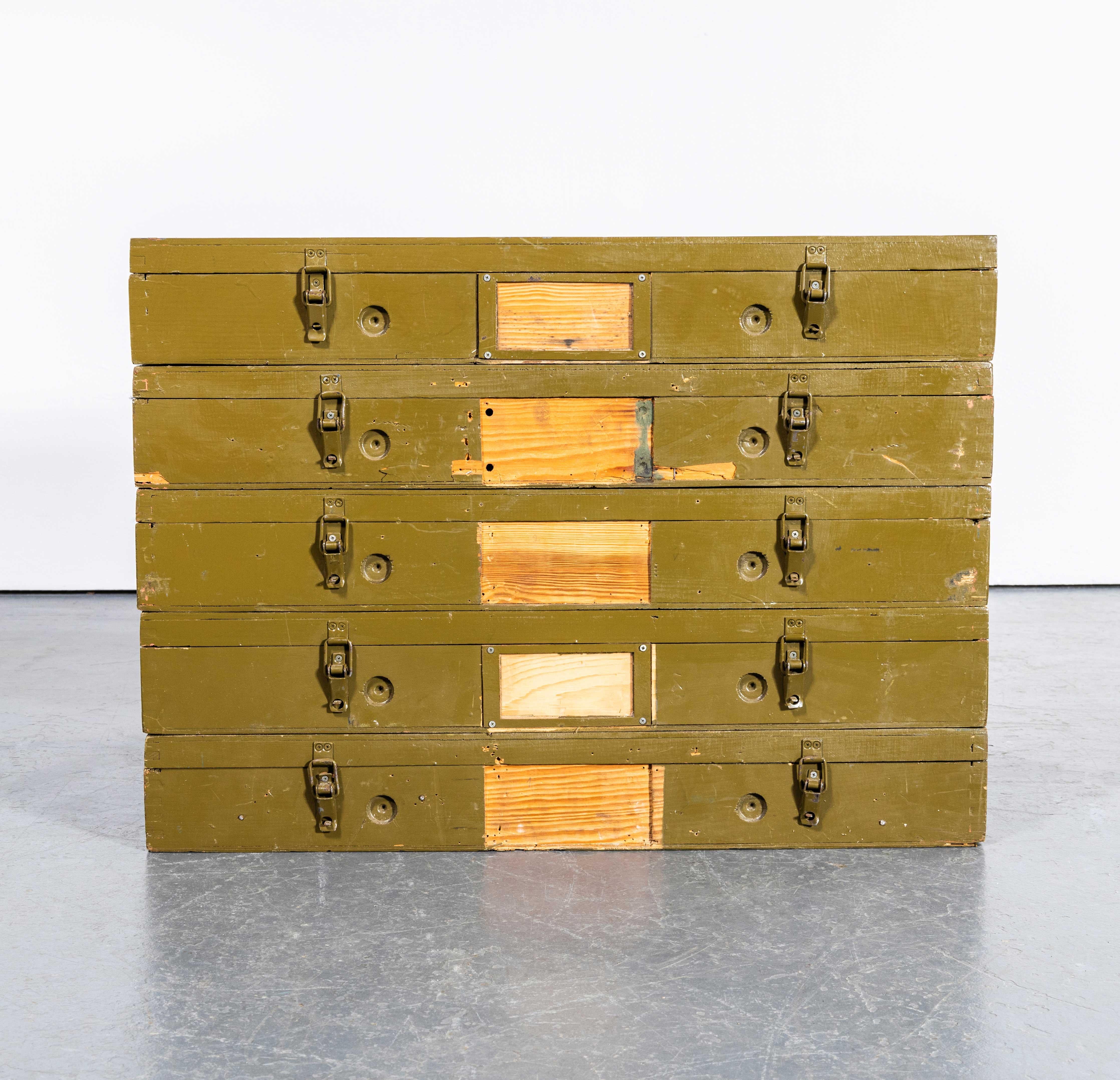 1950's Original Military Storage Boxes - Set Of Five Khaki. 
We recently cleared a military storage depot in Latvia where we found these boxes. Sold as is, a set of five as seen. Brilliant as display or stacked up as is they make great unusual low