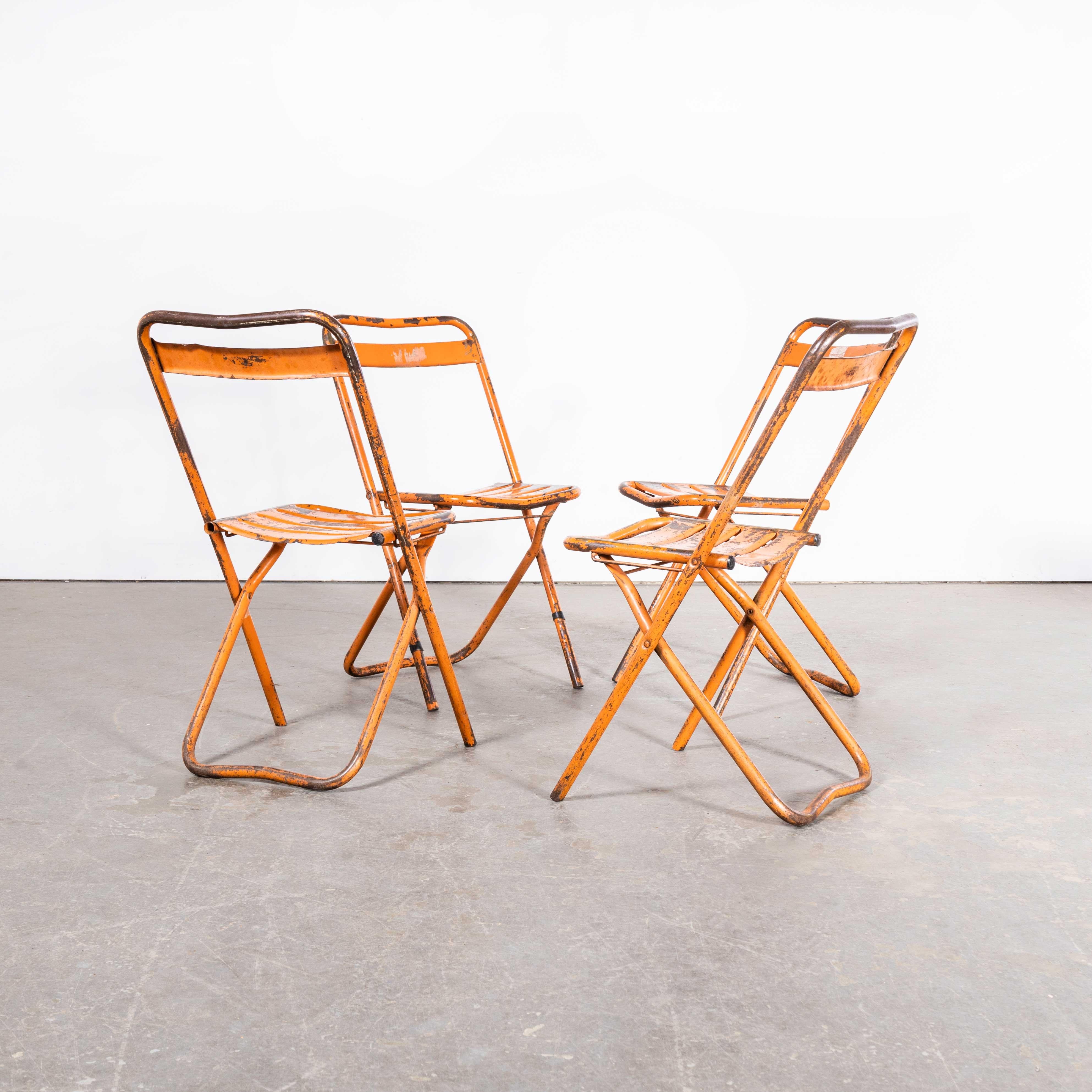 French 1950's Original Orange Tolix Folding Metal Outdoor Chairs - Set Of Four For Sale