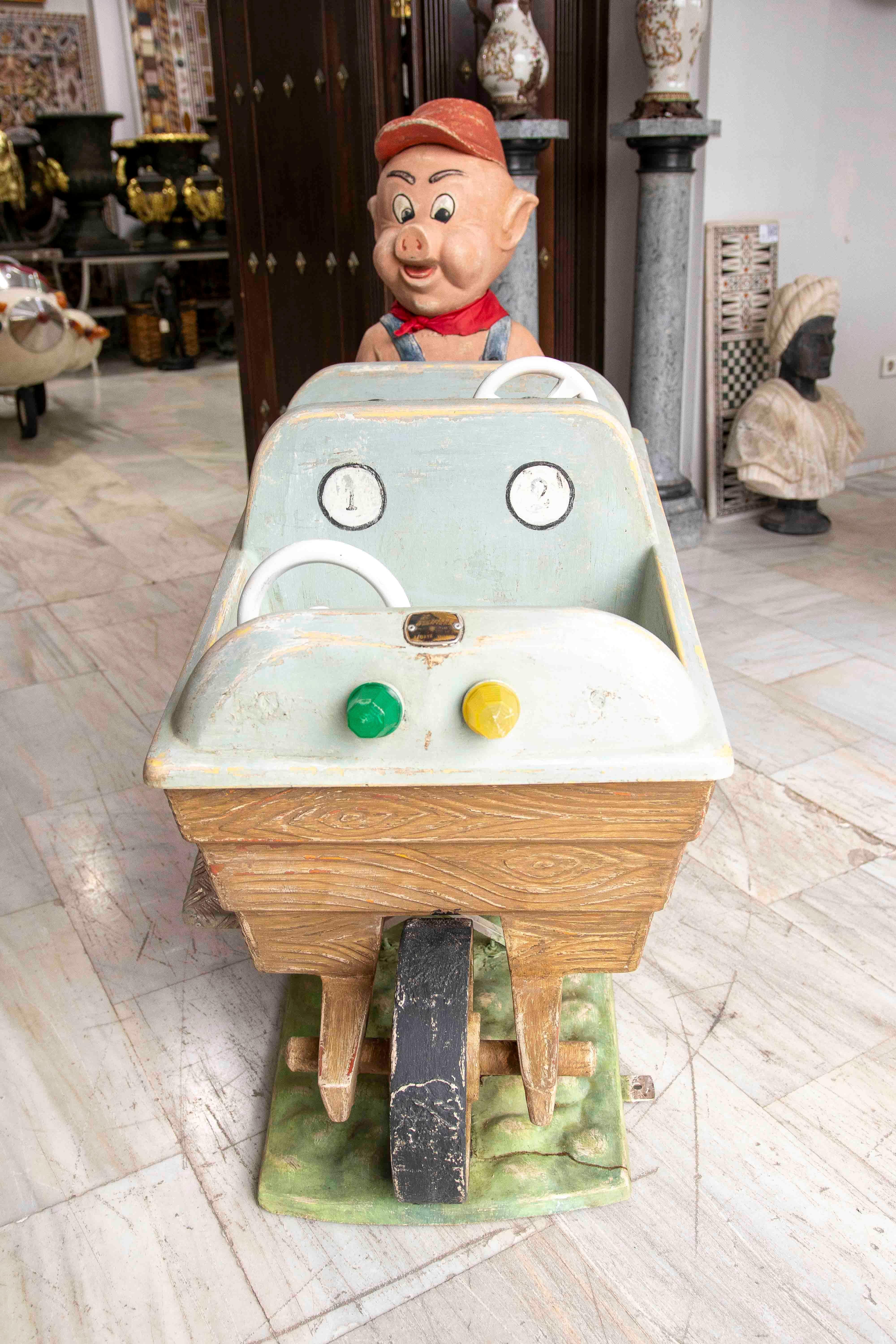 Carosello da fiera originale degli anni '50 del secolo scorso del maiale delle miniere con un bambino in vendita 1