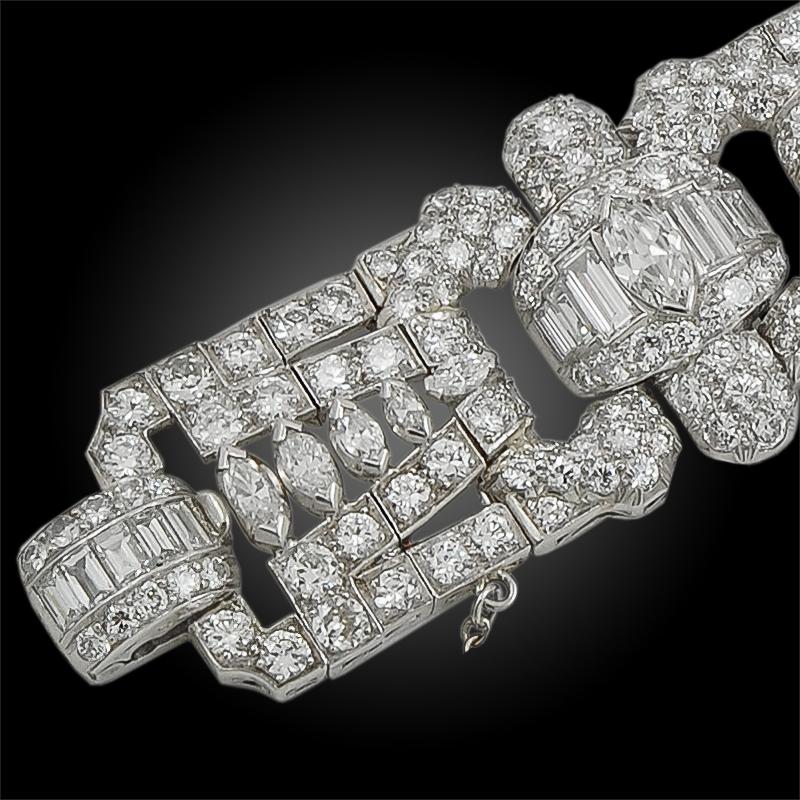 An exceptional piece by Oscar Heyman that dates back to the 1950s, pavé set with 25 carats of marquise, baguette and round brilliant cut diamonds, featuring openwork buckles. This exquisite piece measures approximately 7 1/4 inches in length and 7/8