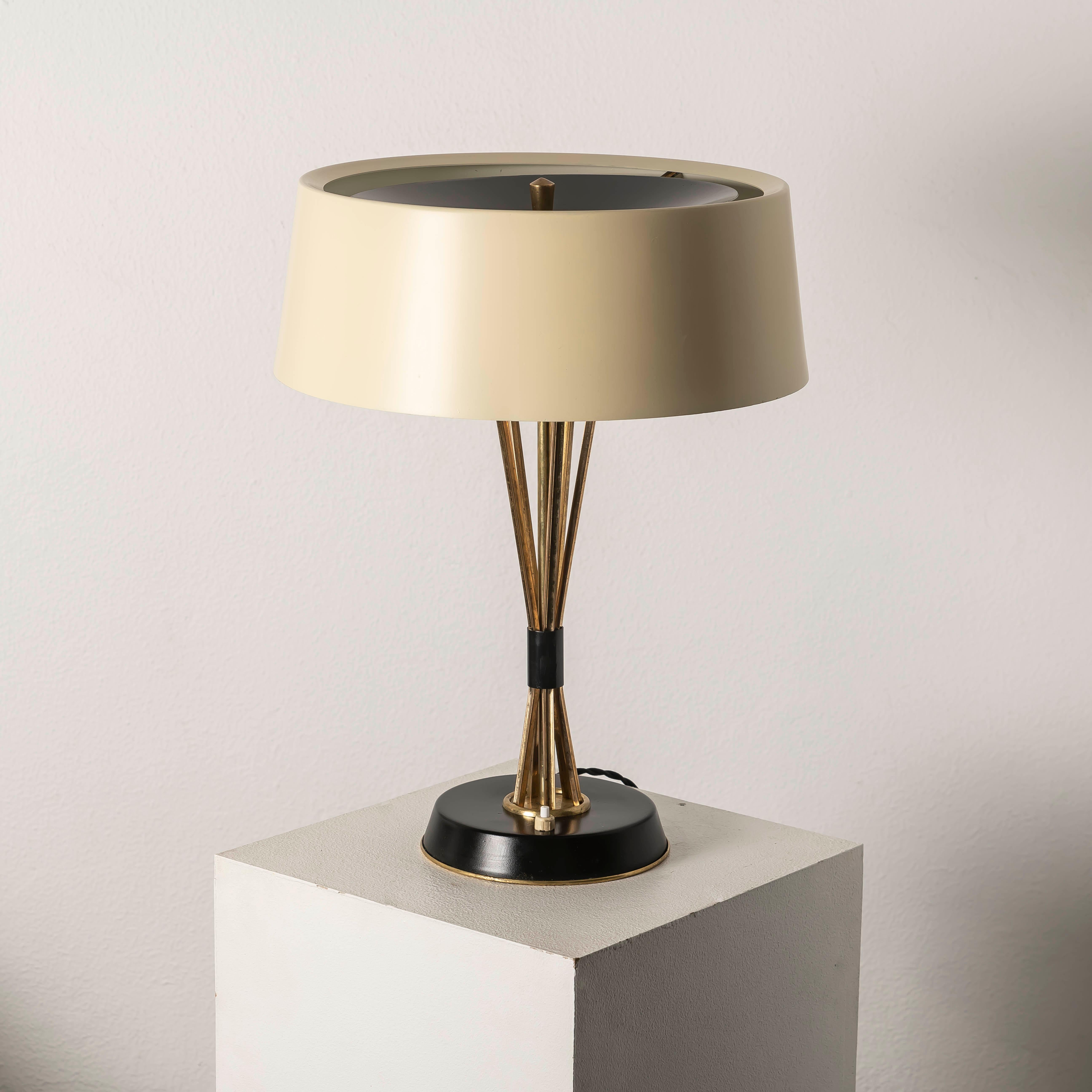 The 1950s Oscar Torlasco Lumi Table Lamp is an extraordinary piece of midcentury Italian design, blending function, elegance, and craftsmanship. Designed by Oscar Torlasco, one of Italy’s most celebrated lighting designers, this lamp is a rare