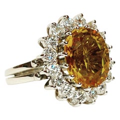 1950s Oval 5 Carat Citrine, 1.12 Carat Diamonds 18k White Gold Cluster Ring