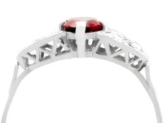1950s Oval Cut Garnet and Diamond Platinum Cocktail Ring