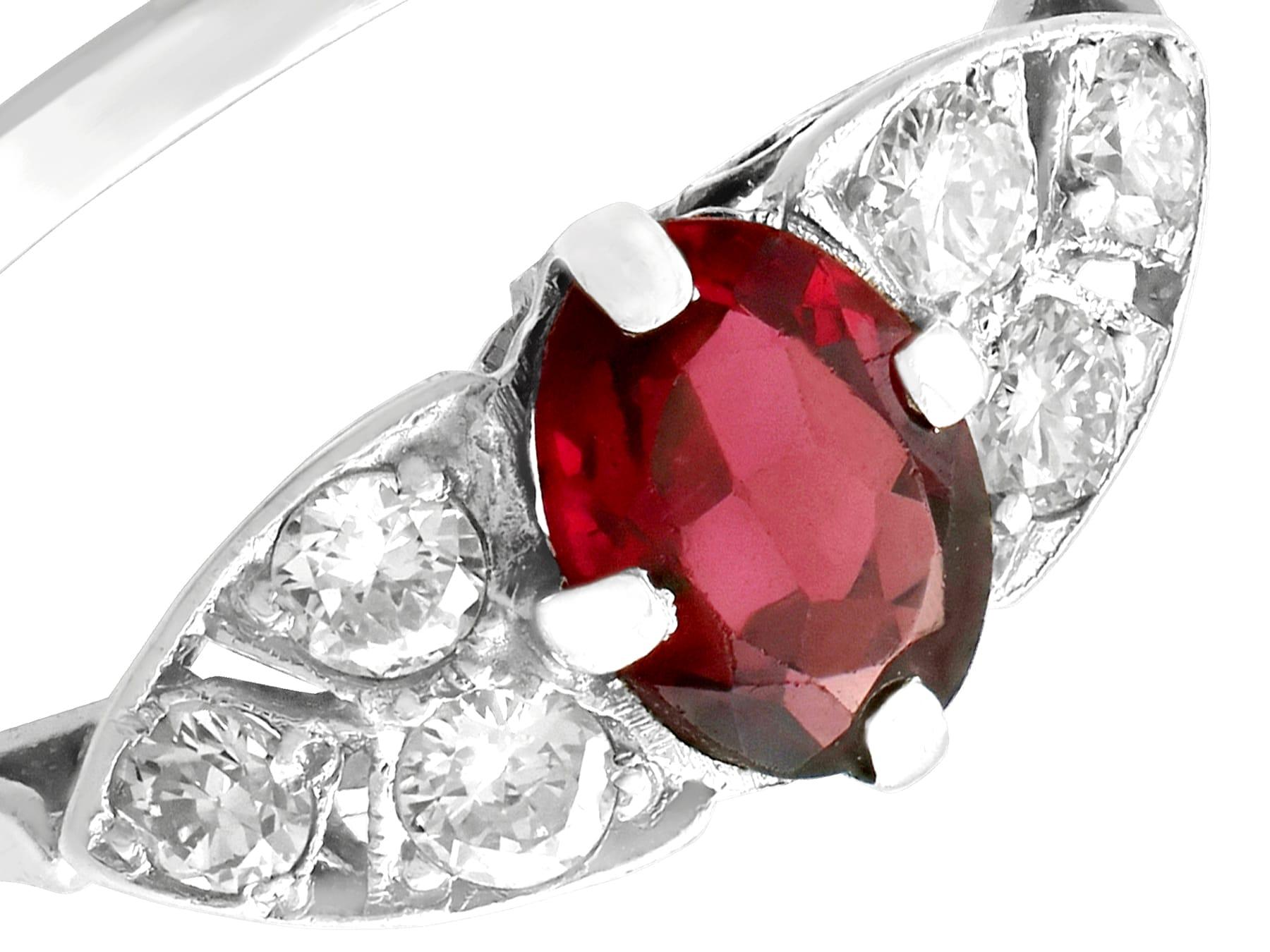 1950s Oval Cut Garnet and Diamond Platinum Cocktail Ring In Excellent Condition For Sale In Jesmond, Newcastle Upon Tyne