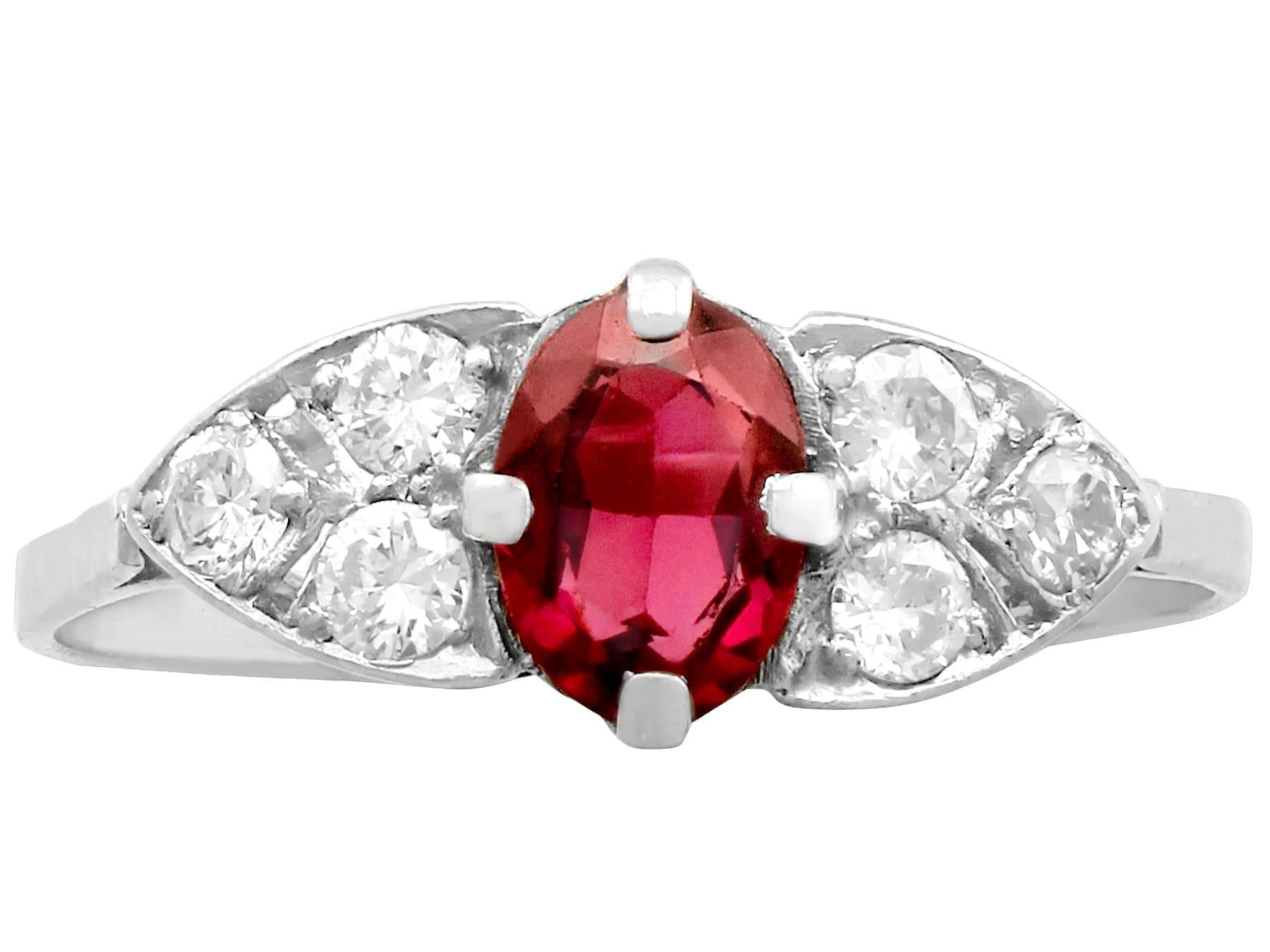 Women's 1950s Oval Cut Garnet and Diamond Platinum Cocktail Ring For Sale