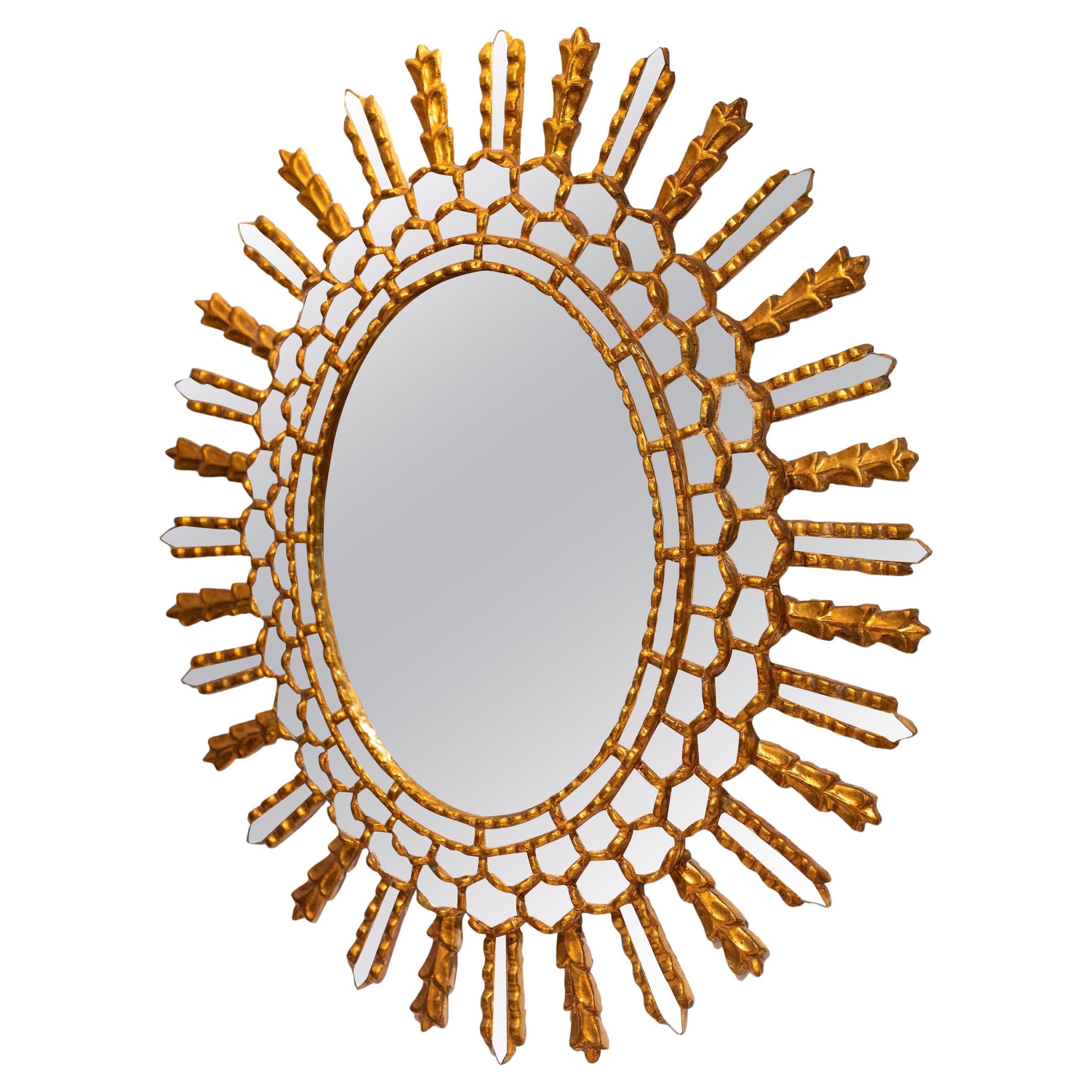 1950s oval shape Italian gilt on wood sun mirror