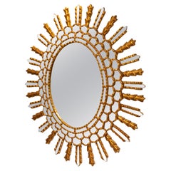 1950s oval shape Italian gilt on wood sun mirror
