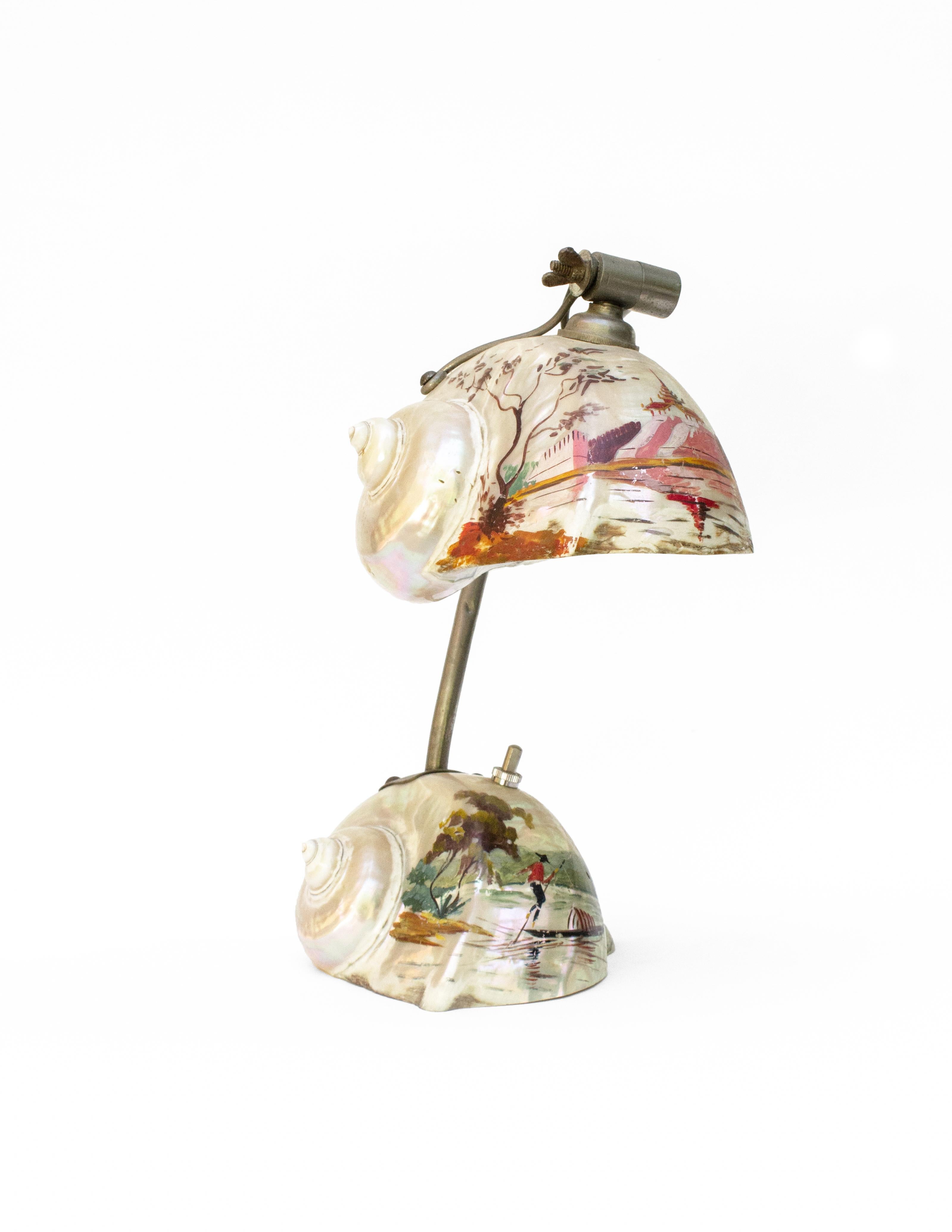 1950s English hand painted chinoiserie double shell pearl nautilus table lamp. Top shell light is on a silver swivel arm.