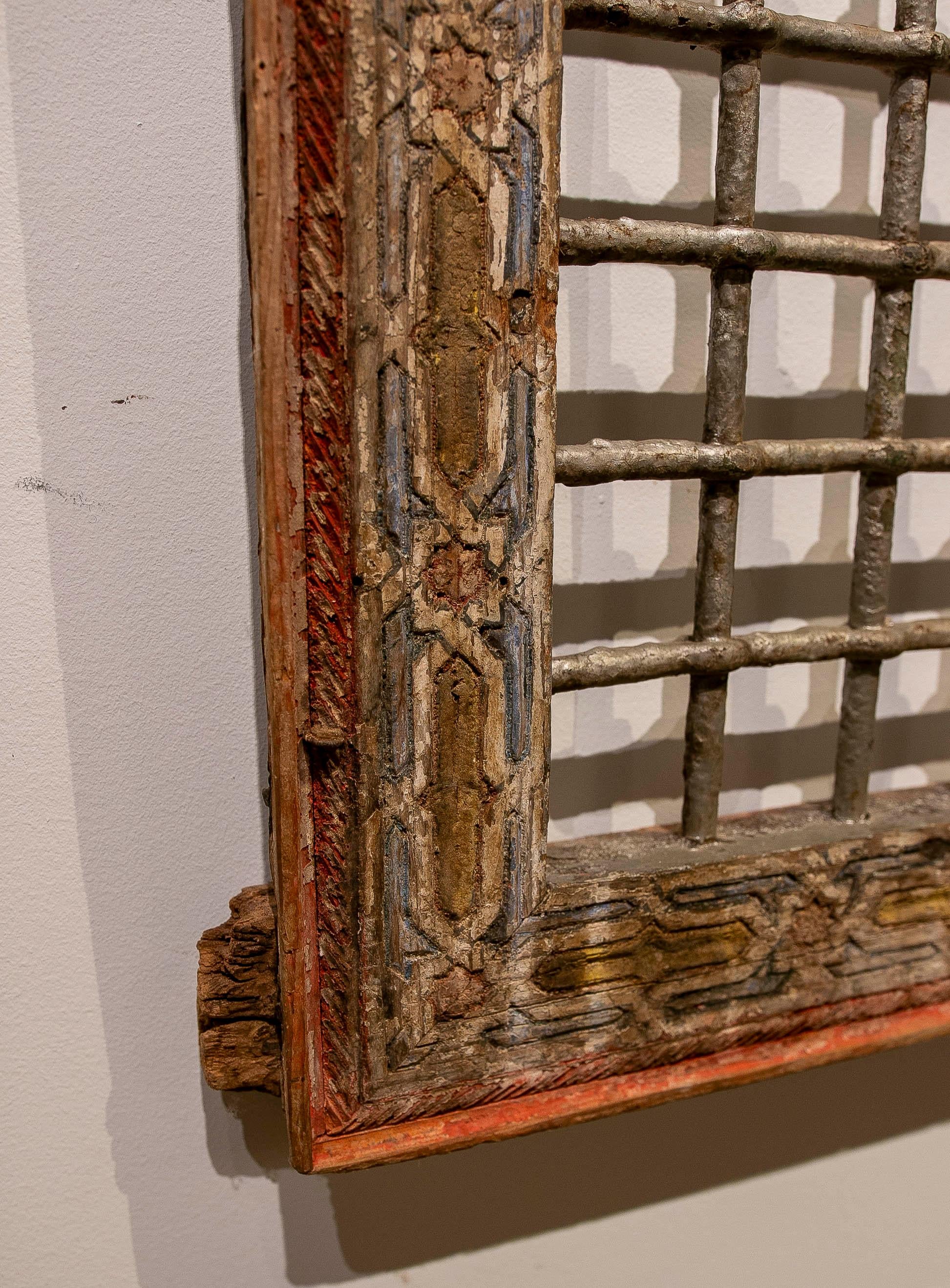 1950s Pair of Antique Carved Iron Grilles with Original Polychrome Frame In Good Condition For Sale In Marbella, ES