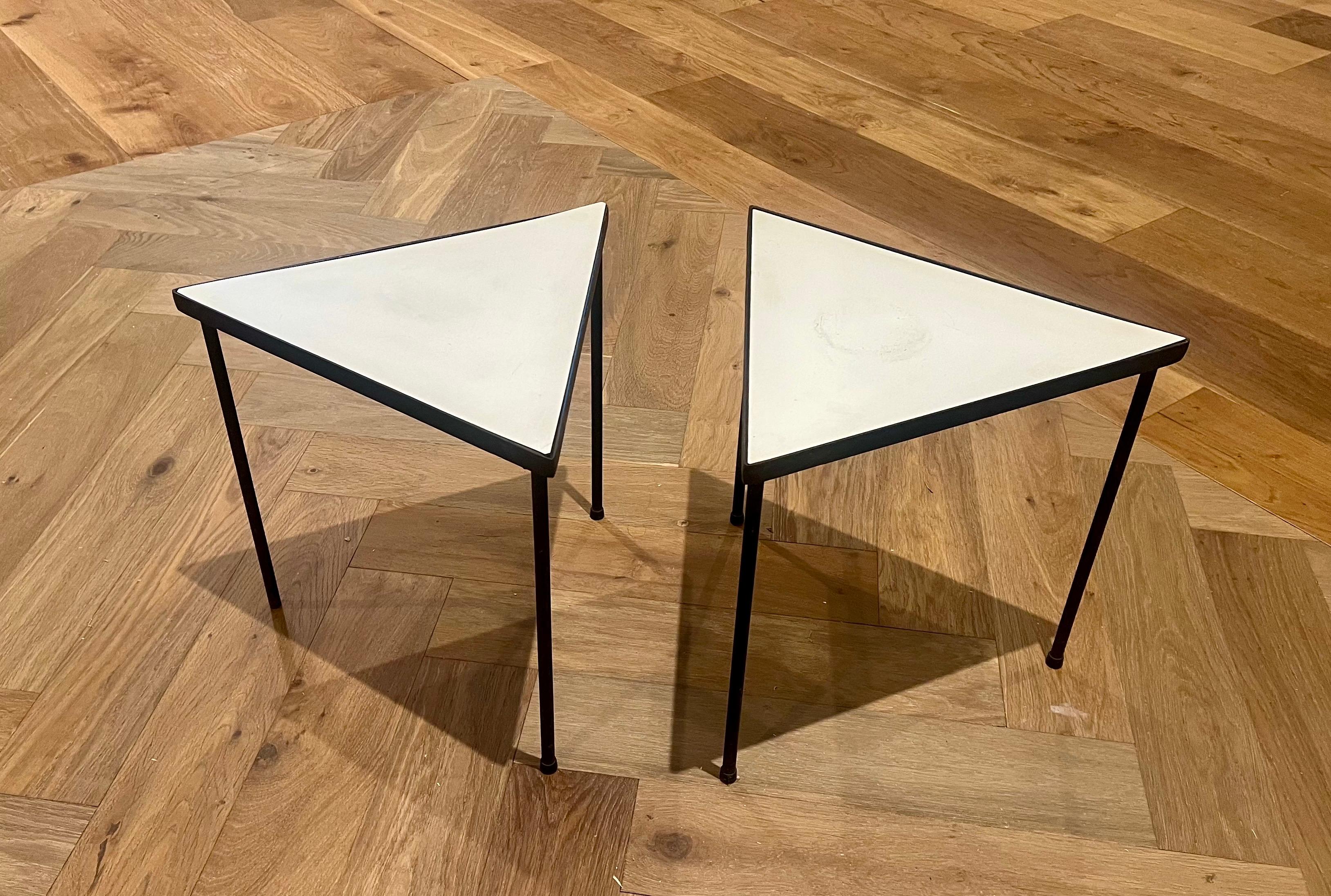 1950s American Mid Century Modern, Atomic age pair of stackable triangle table with white color laminate top great accent table for indoor or outdoor use, can be combined with Memphis postmodern decor. Designed by Frederick Weinberg.