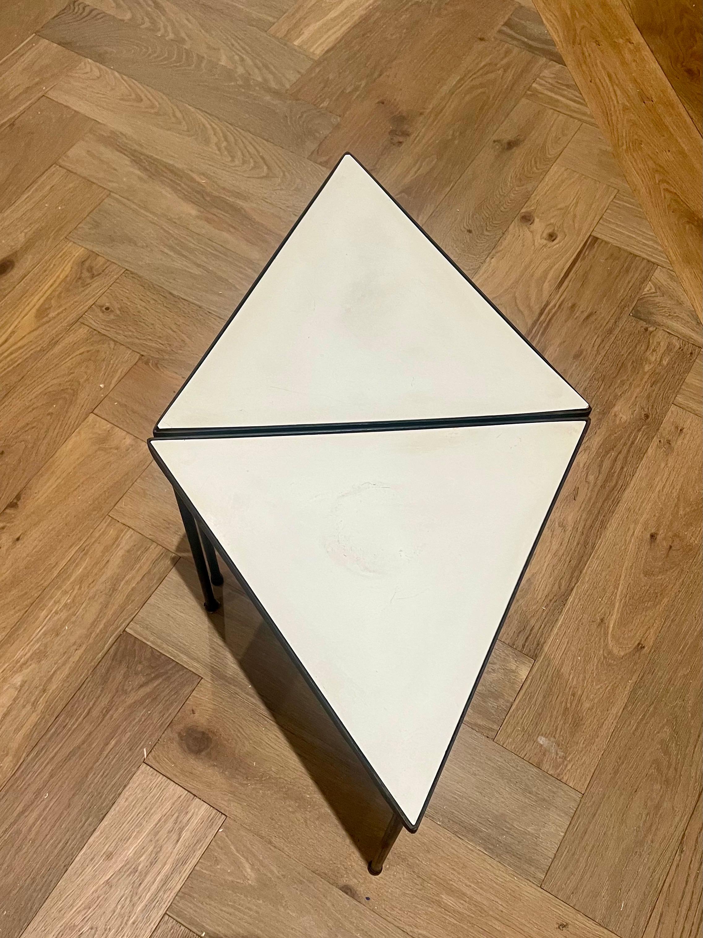 American 1950's Pair of Atomic Age Stackable Triangle tables in Iron & White Laminate Top For Sale