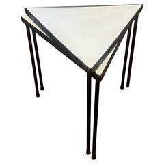 1950's Pair of Atomic Age Stackable Triangle tables in Iron & White Laminate Top