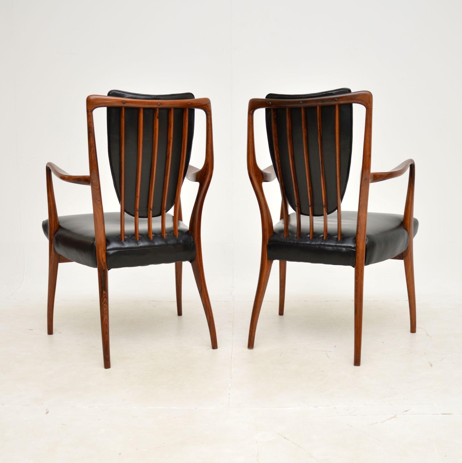 British 1950s Pair of Carver Armchairs by Andrew Milne For Sale