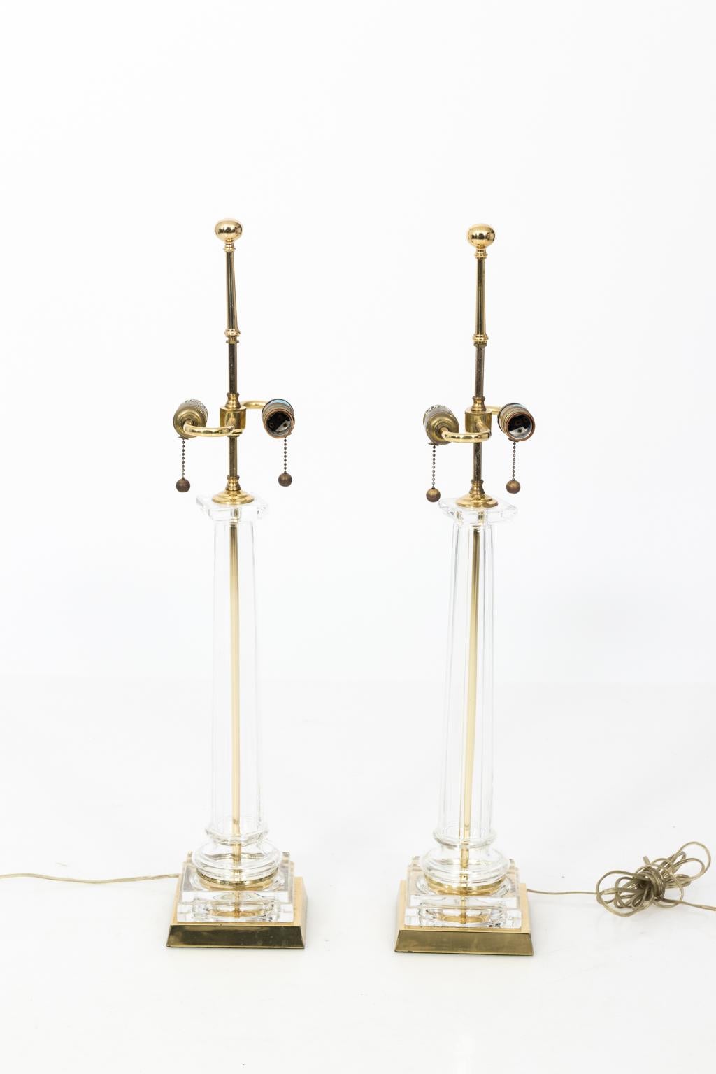 1950s Chapman glass column lamps with brass bases. Shades not included.
  