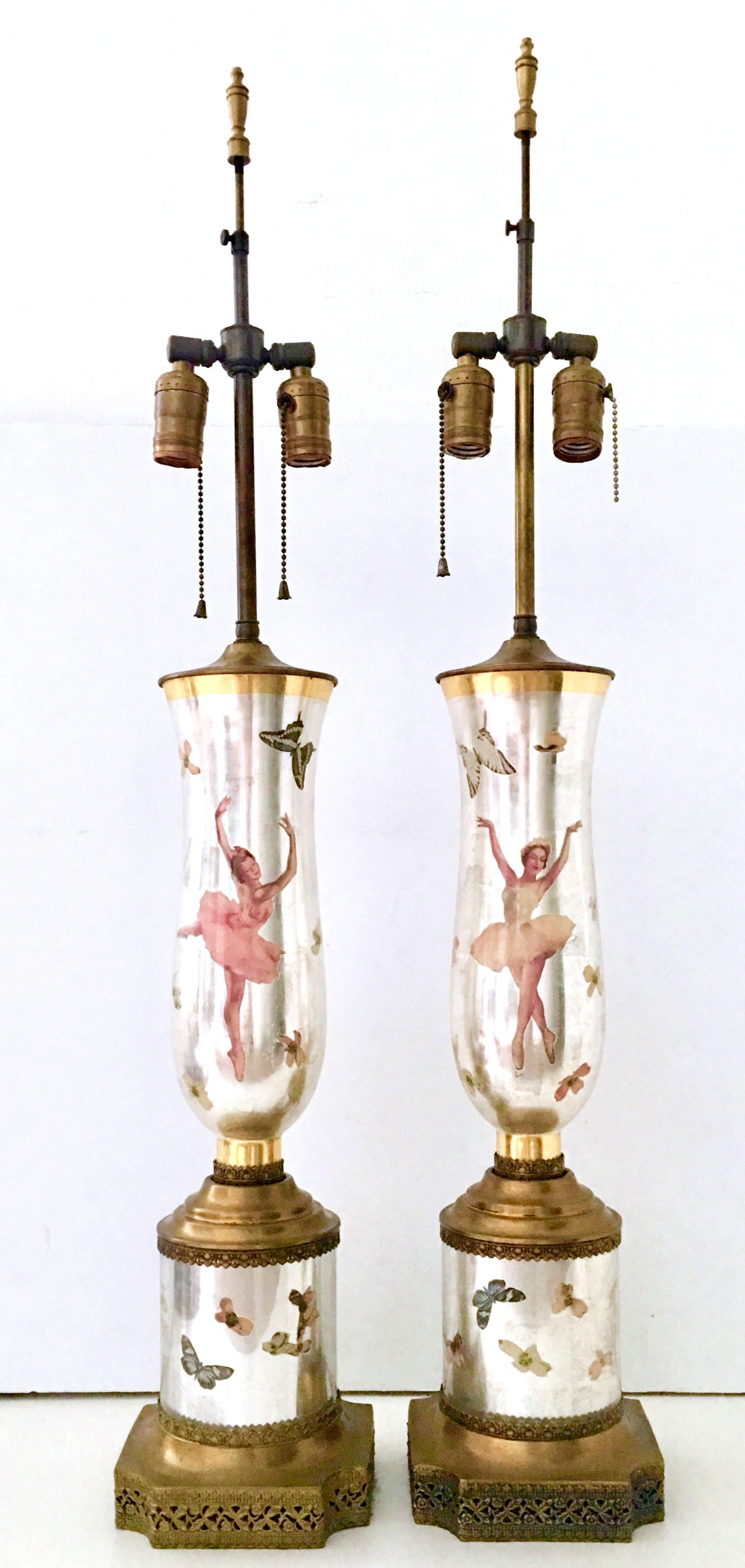 20th Century Fine Pair Of Art Deco Style Eglomise Reverse Painted Silver Art Glass Ballerina & Butterfly Decoupage  Lamps. Beautifully executed with original brass filigree hardware and fittings. Double socket pull chain detail.
Wired for the US and