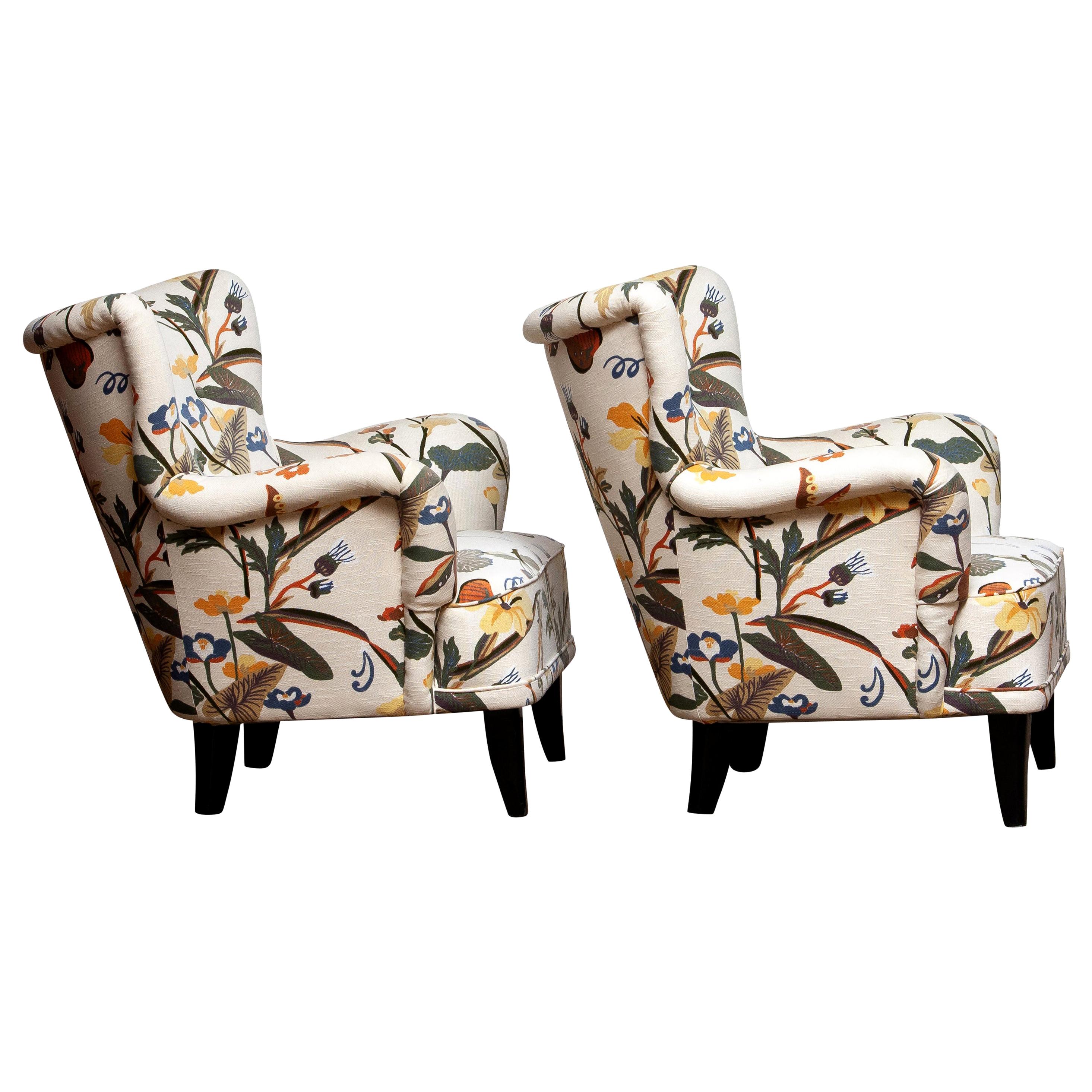 Set of two beautiful 1940s-1950s lounge / club chairs reupholstered, in a later period, with the typical floral print fabric designed by Josef Frank.
The chairs are designed by Ilmari Lappalainen for Asko in Finland
The overall condition is good.