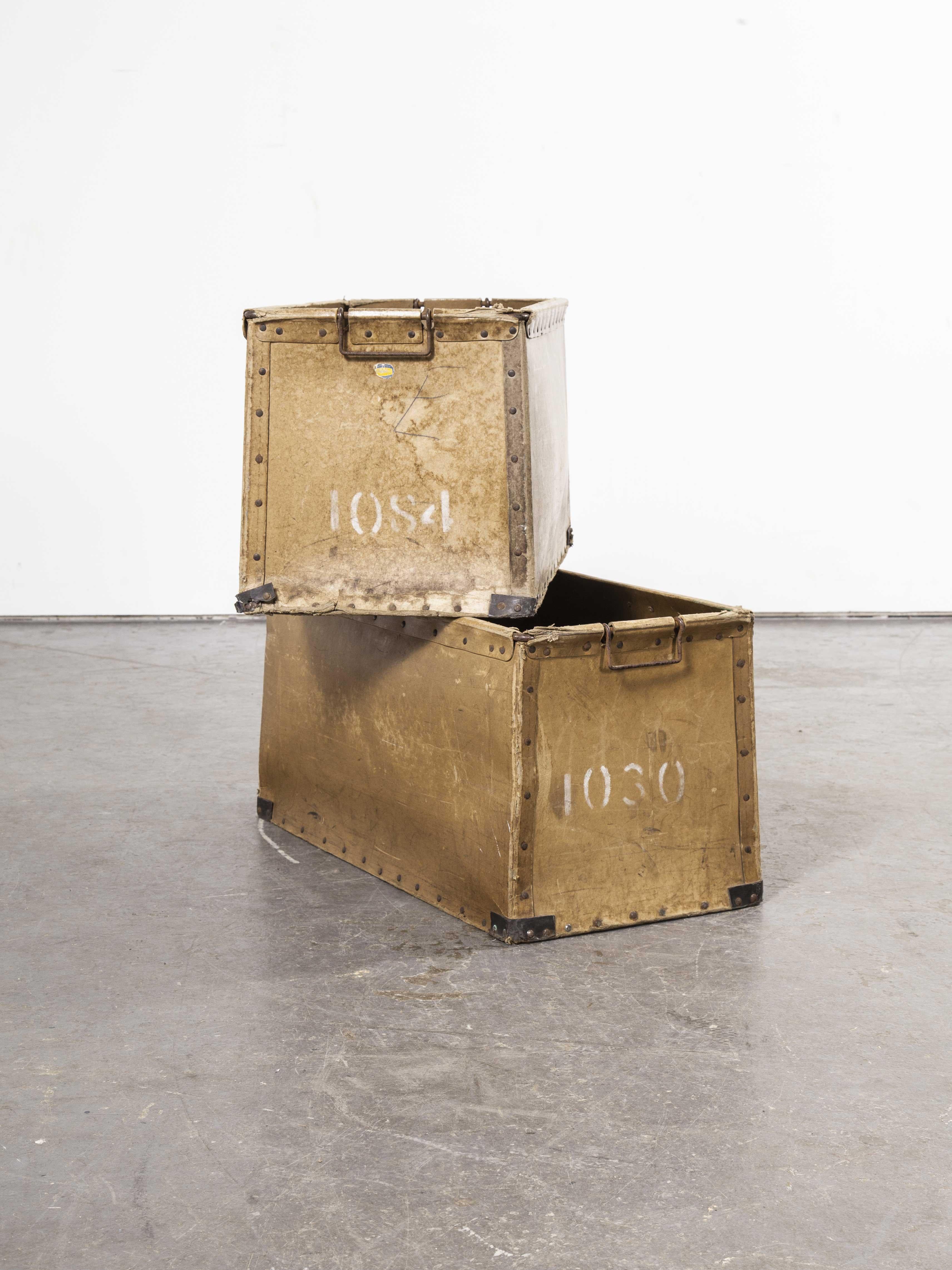 1950s pair of French Vulcanised card Industrial crates

1950s pair of French Vulcanised card Industrial crates. Vulcanised card was the material of choice for heavy duty practical Industrial tote crates. Suroy was the market leader but they were