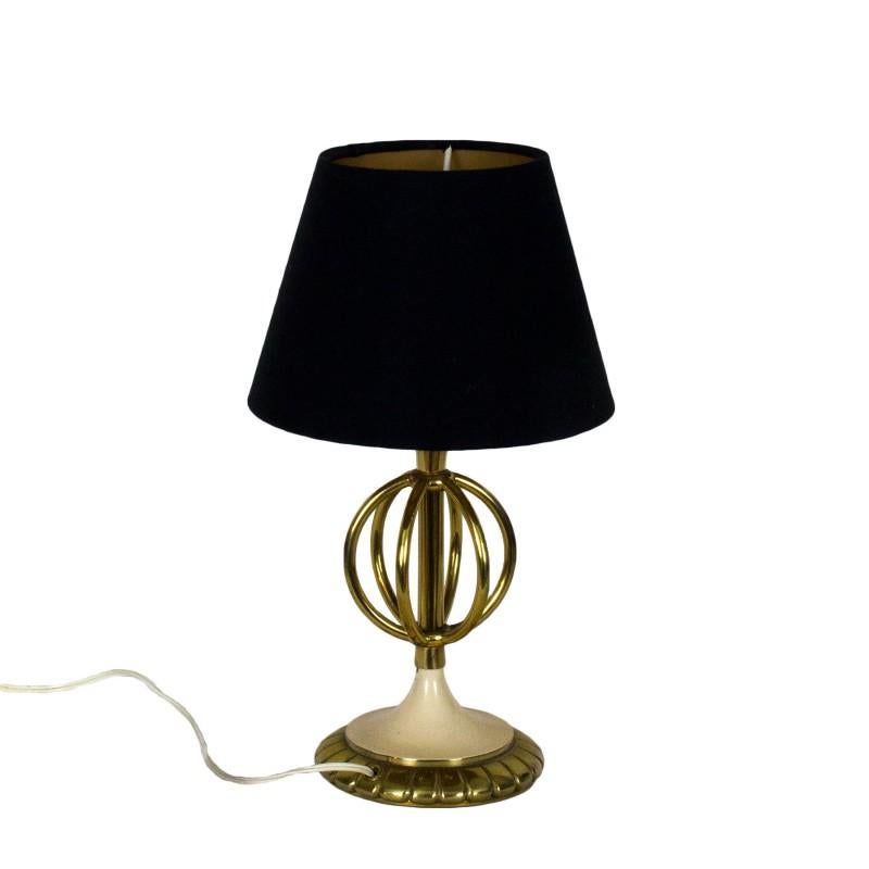 Pair of mini table lamps, polished brass and lacquered steel. Black and golden lampshades.

France, circa 1950.