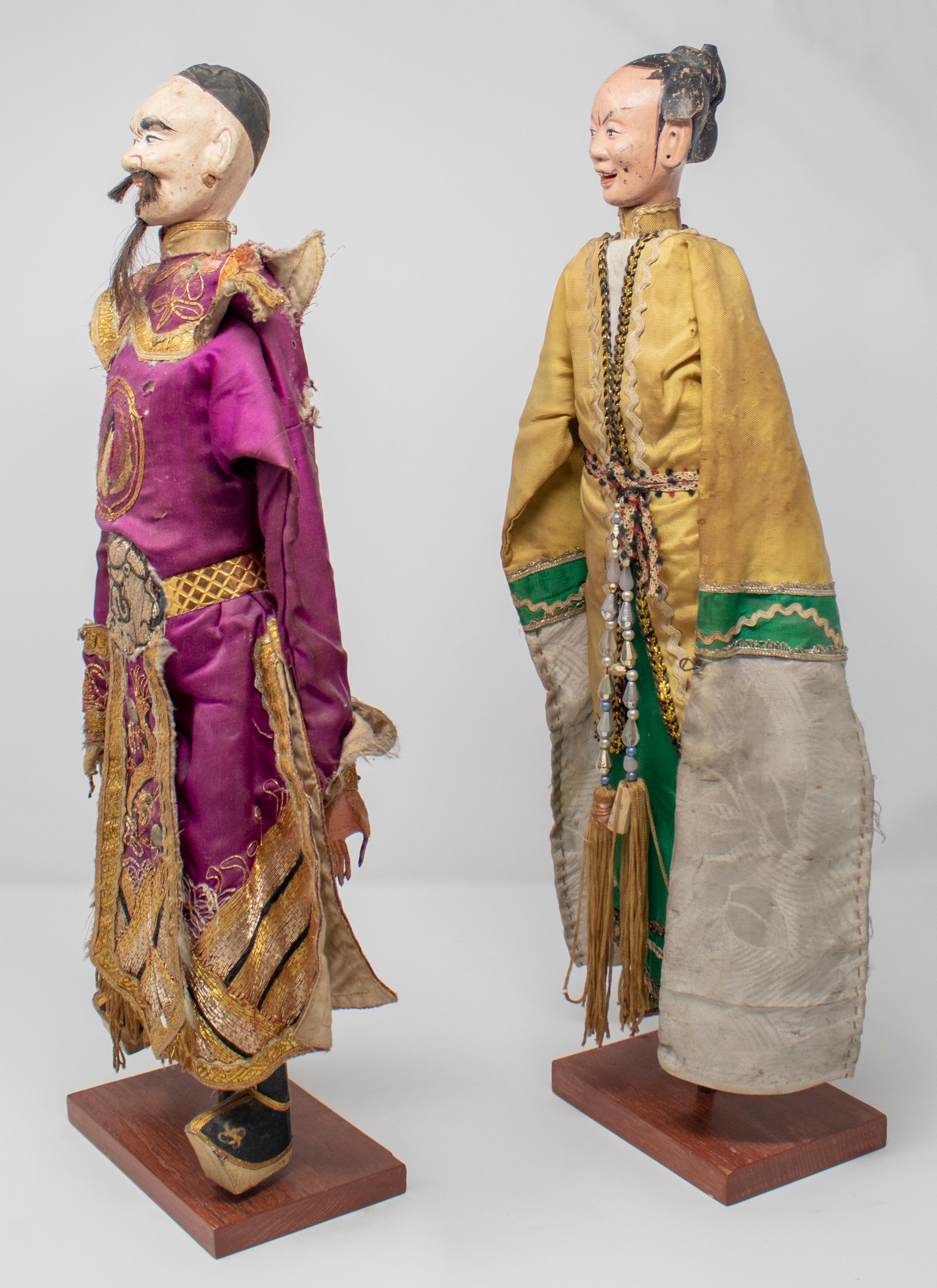 1950s pair of Oriental puppet marionettes with original dress.