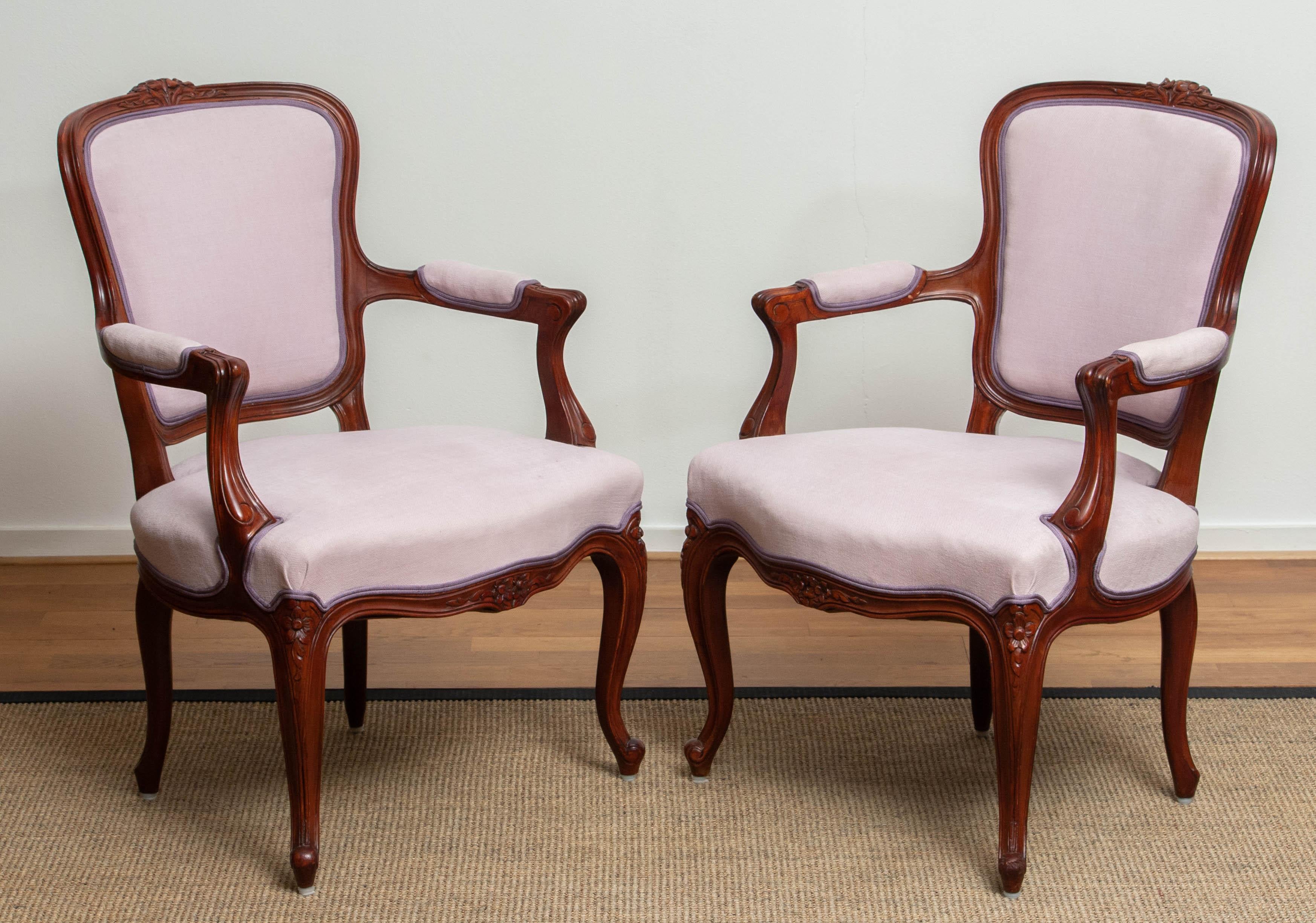 1950s, the Swedish Neo-Rococo, and finished in the shabby chic technique armchair is in perfect condition. Upholstered in pink fabric and two extra cushions for extra comfort also in pink jacquard. Seat height with the extra cushion is: 21.20 inches